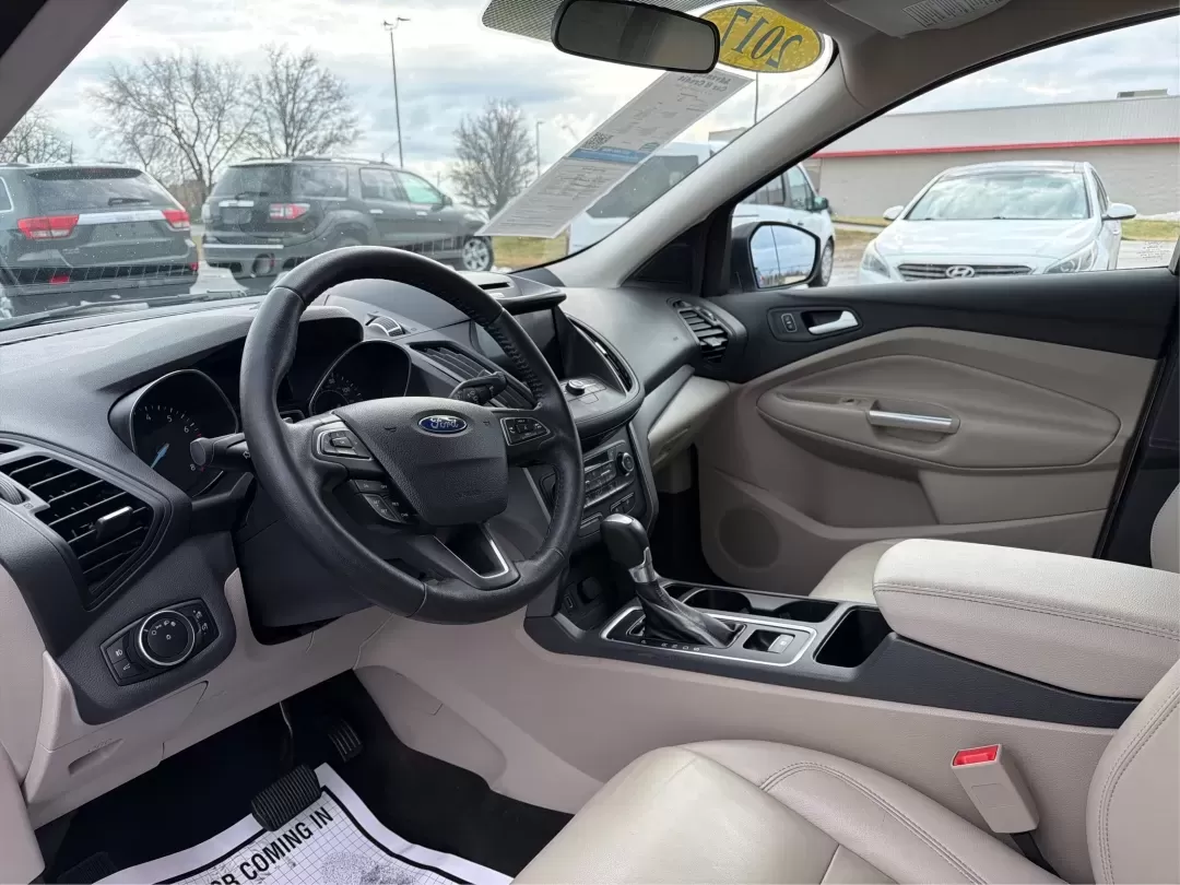 2017 Ford Escape SE (1FMCU0G95HU) with an Other engine, located at 8750 N County Rd 25A, Piqua, OH, 45356, (937) 908-9800, 40.164391, -84.232513 - Are you ready to elevate your lifestyle with a vehicle that perfectly balances comfort, versatility, and affordability? Look no further than the stunning 2017 Ford Escape SE, available now at Advantage Car and Credit - Piqua. This SUV is not just a vehicle; it's your new partner for family outings, - Photo#9