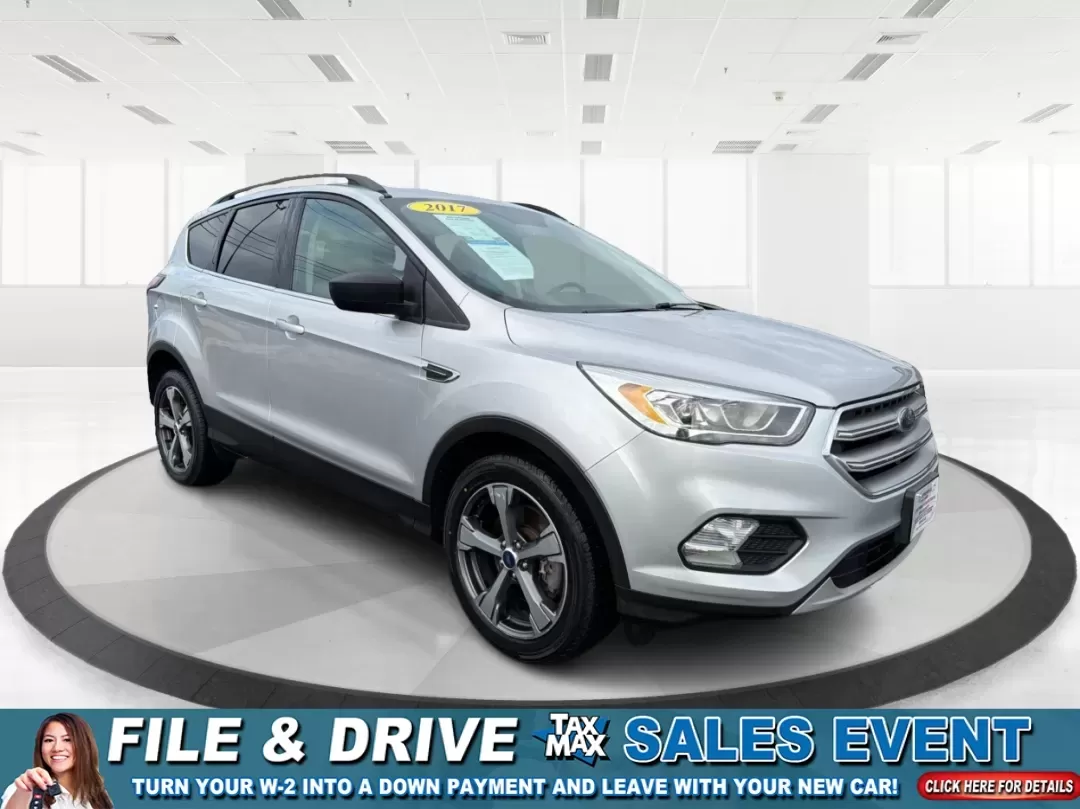 2017 Ford Escape SE (1FMCU0G95HU) with an 2.0L L4 DOHC 16V engine, 6A transmission, located at 8750 N County Rd 25A, Piqua, OH, 45356, (937) 908-9800, 40.164391, -84.232513 - Are you ready to elevate your lifestyle with a vehicle that perfectly balances comfort, versatility, and affordability? Look no further than the stunning 2017 Ford Escape SE, available now at Advantage Car and Credit - Piqua. This SUV is not just a vehicle; it's your new partner for family outings, - Photo#0