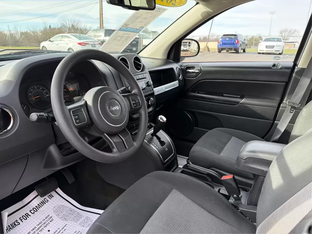 2016 Jeep Compass Sport (1C4NJDBB2GD) with an 2.4L I-4 DOHC engine, located at 1184 Kauffman Ave, Fairborn, OH, 45324, (937) 908-9800, 39.807072, -84.030914 - Discover the perfect blend of adventure and practicality with the 2016 Jeep Compass Sport, available now at Advantage Car and Credit in Fairborn, OH. This versatile SUV is designed for those who crave both weekend escapades and everyday functionality. Whether you're a growing family looking for a sp - Photo#9