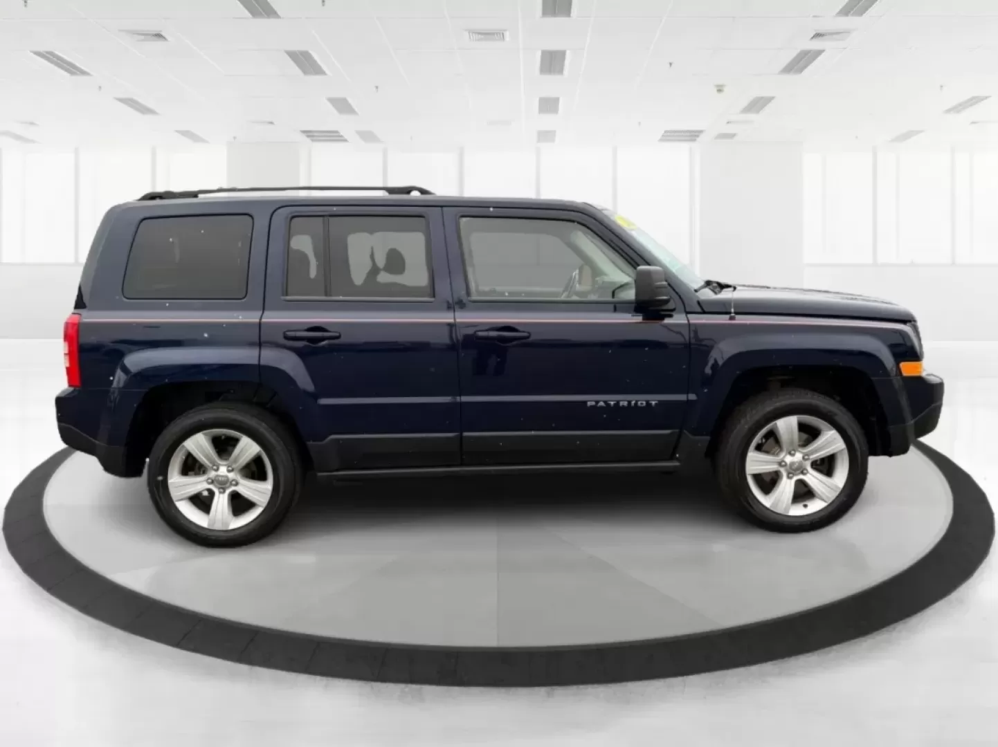 2014 Jeep Patriot Latitude (1C4NJRFB0ED) with an 2.4L I-4 DOHC engine, located at 1099 N County Rd 25A , Troy, OH, 45373, (937) 908-9800, 40.057079, -84.212883 - **Explore the Open Road in Style: 2014 Jeep Patriot Latitude at Advantage Car and Credit - Troy**<br /> <br /> Are you ready for your next adventure? The 2014 Jeep Patriot Latitude is the perfect vehicle for those who crave exploration and flexibility in their daily lives. Whether you're navigating - Photo#1
