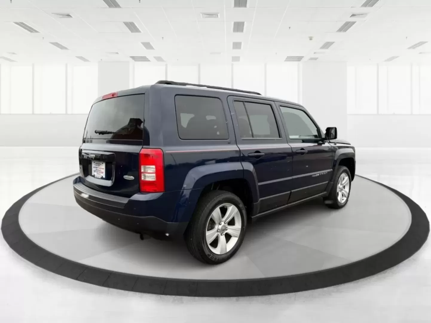 2014 Jeep Patriot Latitude (1C4NJRFB0ED) with an 2.4L I-4 DOHC engine, located at 1099 N County Rd 25A , Troy, OH, 45373, (937) 908-9800, 40.057079, -84.212883 - **Explore the Open Road in Style: 2014 Jeep Patriot Latitude at Advantage Car and Credit - Troy**<br /> <br /> Are you ready for your next adventure? The 2014 Jeep Patriot Latitude is the perfect vehicle for those who crave exploration and flexibility in their daily lives. Whether you're navigating - Photo#2