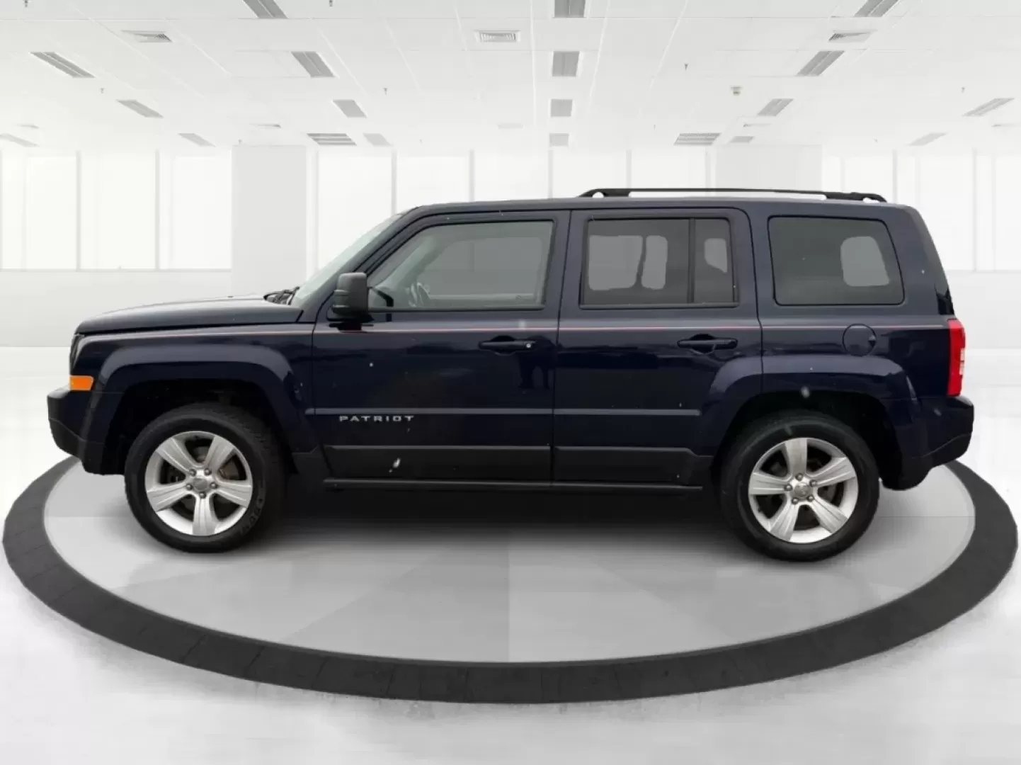 2014 Jeep Patriot Latitude (1C4NJRFB0ED) with an 2.4L I-4 DOHC engine, located at 1099 N County Rd 25A , Troy, OH, 45373, (937) 908-9800, 40.057079, -84.212883 - **Explore the Open Road in Style: 2014 Jeep Patriot Latitude at Advantage Car and Credit - Troy**<br /> <br /> Are you ready for your next adventure? The 2014 Jeep Patriot Latitude is the perfect vehicle for those who crave exploration and flexibility in their daily lives. Whether you're navigating - Photo#5