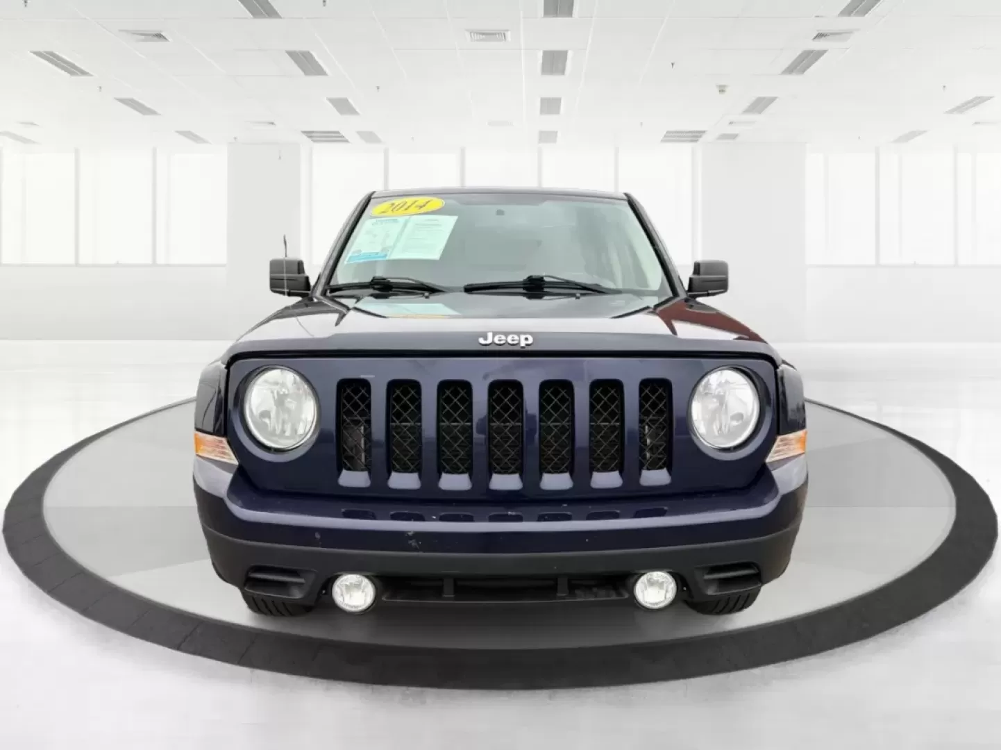 2014 Jeep Patriot Latitude (1C4NJRFB0ED) with an 2.4L I-4 DOHC engine, located at 1099 N County Rd 25A , Troy, OH, 45373, (937) 908-9800, 40.057079, -84.212883 - **Explore the Open Road in Style: 2014 Jeep Patriot Latitude at Advantage Car and Credit - Troy**<br /> <br /> Are you ready for your next adventure? The 2014 Jeep Patriot Latitude is the perfect vehicle for those who crave exploration and flexibility in their daily lives. Whether you're navigating - Photo#7