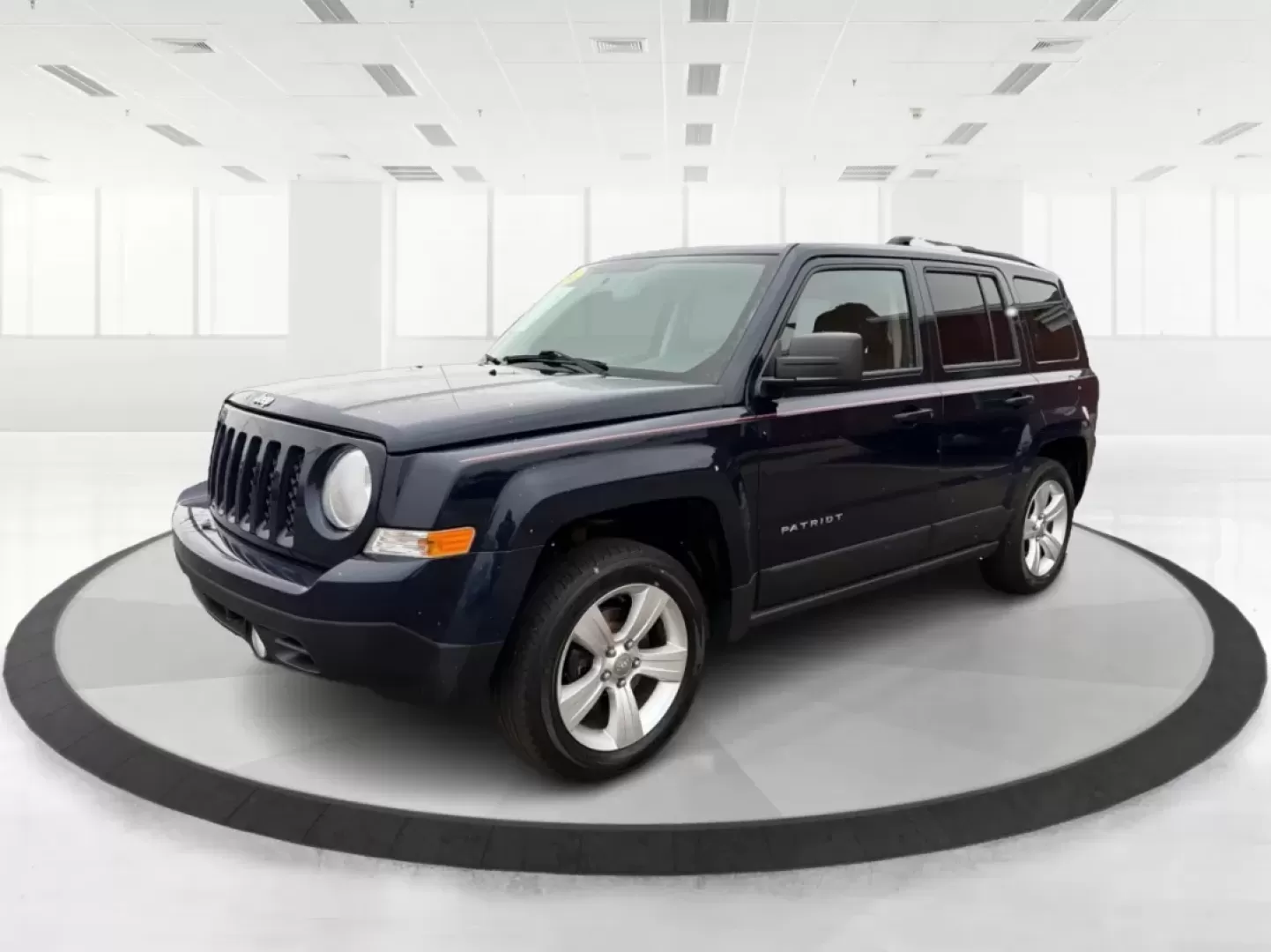 2014 Jeep Patriot Latitude (1C4NJRFB0ED) with an 2.4L I-4 DOHC engine, located at 1099 N County Rd 25A , Troy, OH, 45373, (937) 908-9800, 40.057079, -84.212883 - **Explore the Open Road in Style: 2014 Jeep Patriot Latitude at Advantage Car and Credit - Troy**<br /> <br /> Are you ready for your next adventure? The 2014 Jeep Patriot Latitude is the perfect vehicle for those who crave exploration and flexibility in their daily lives. Whether you're navigating - Photo#8