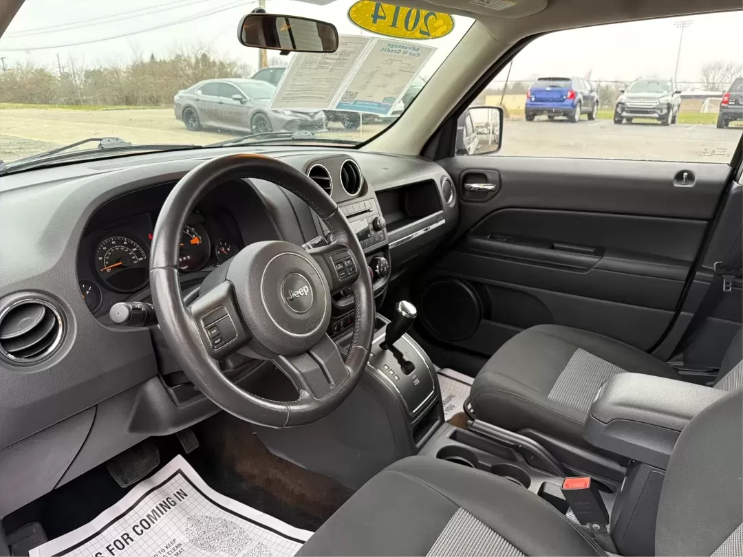 2014 Jeep Patriot Latitude (1C4NJRFB0ED) with an 2.4L I-4 DOHC engine, located at 1099 N County Rd 25A , Troy, OH, 45373, (937) 908-9800, 40.057079, -84.212883 - One Owner - Photo#9