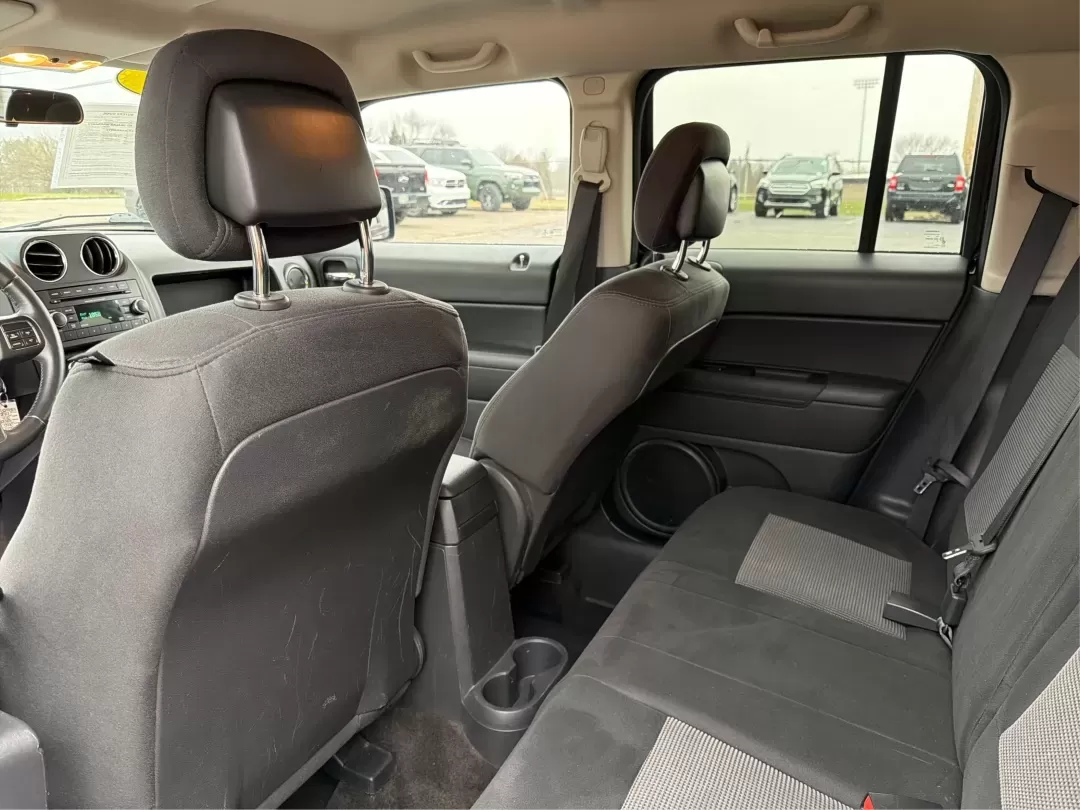 2014 Jeep Patriot Latitude (1C4NJRFB0ED) with an 2.4L I-4 DOHC engine, located at 1099 N County Rd 25A , Troy, OH, 45373, (937) 908-9800, 40.057079, -84.212883 - One Owner - Photo#10