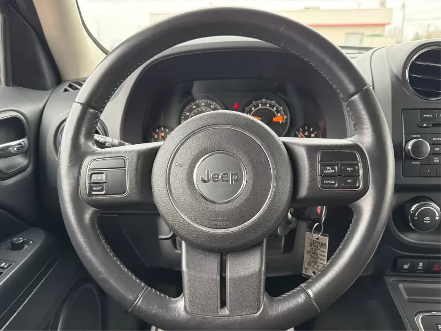 2014 Jeep Patriot Latitude (1C4NJRFB0ED) with an 2.4L I-4 DOHC engine, located at 1099 N County Rd 25A , Troy, OH, 45373, (937) 908-9800, 40.057079, -84.212883 - **Explore the Open Road in Style: 2014 Jeep Patriot Latitude at Advantage Car and Credit - Troy**<br /> <br /> Are you ready for your next adventure? The 2014 Jeep Patriot Latitude is the perfect vehicle for those who crave exploration and flexibility in their daily lives. Whether you're navigating - Photo#16