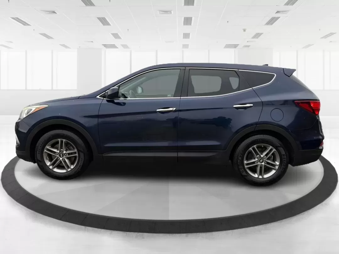 2017 Hyundai Santa Fe 2.4L (5XYZTDLB6HG) with an Theta II 2.4L I-4 gasoline direct injection engine, located at 1099 N County Rd 25A , Troy, OH, 45373, (937) 908-9800, 40.057079, -84.212883 - 2017 Hyundai Santa Fe 2.4L - Photo#5