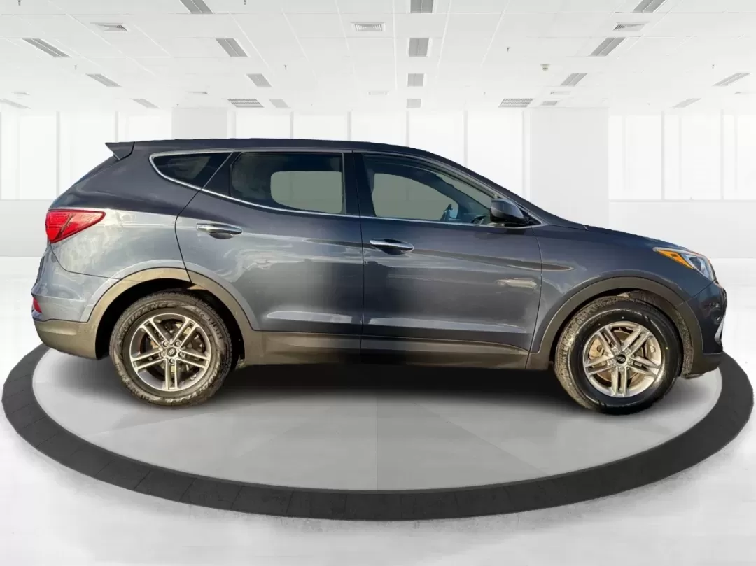 2017 Hyundai Santa Fe 2.4L (5NMZT3LBXHH) with an Theta II 2.4L I-4 gasoline direct injection engine, located at 880 E. National Road, Vandalia, OH, 45377, (937) 908-9800, 39.891918, -84.183594 - 2017 Hyundai Santa Fe 2.4L - Photo#1