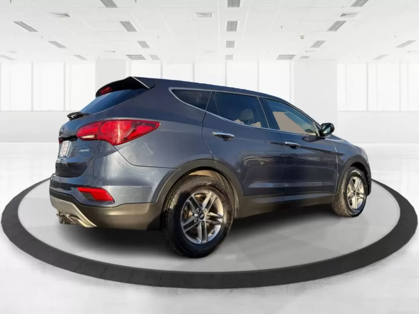 2017 Hyundai Santa Fe 2.4L (5NMZT3LBXHH) with an Theta II 2.4L I-4 gasoline direct injection engine, located at 880 E. National Road, Vandalia, OH, 45377, (937) 908-9800, 39.891918, -84.183594 - Discover your next adventure with the 2017 Hyundai Santa Fe, now available at Advantage Car and Credit in Vandalia, OH! This versatile SUV is perfect for families, commuters, and weekend adventurers alike. With seating for up to five and ample cargo space, it's ideal for everything from soccer pract - Photo#2