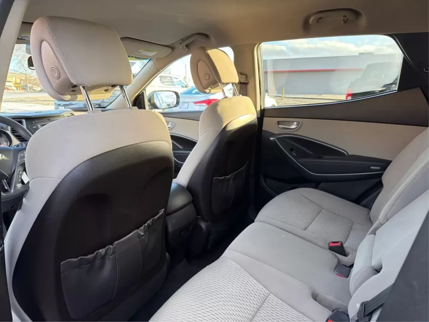 2017 Hyundai Santa Fe 2.4L (5NMZT3LBXHH) with an Theta II 2.4L I-4 gasoline direct injection engine, located at 880 E. National Road, Vandalia, OH, 45377, (937) 908-9800, 39.891918, -84.183594 - Discover your next adventure with the 2017 Hyundai Santa Fe, now available at Advantage Car and Credit in Vandalia, OH! This versatile SUV is perfect for families, commuters, and weekend adventurers alike. With seating for up to five and ample cargo space, it's ideal for everything from soccer pract - Photo#9