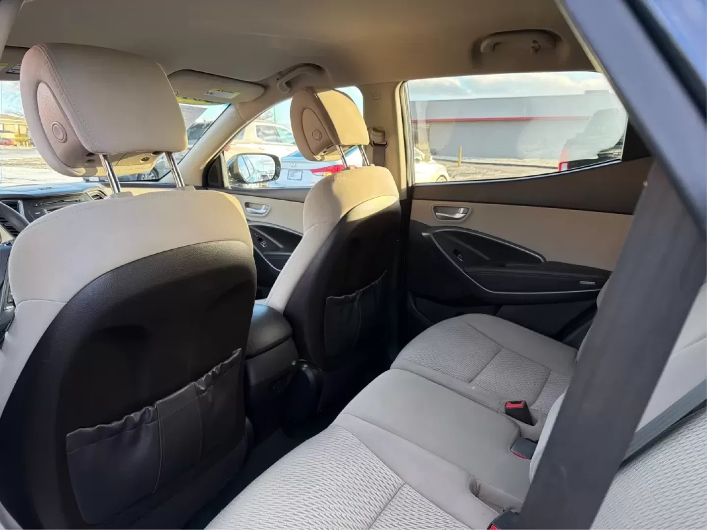 2017 Hyundai Santa Fe 2.4L (5NMZT3LBXHH) with an Theta II 2.4L I-4 gasoline direct injection engine, located at 880 E. National Road, Vandalia, OH, 45377, (937) 908-9800, 39.891918, -84.183594 - Discover your next adventure with the 2017 Hyundai Santa Fe, now available at Advantage Car and Credit in Vandalia, OH! This versatile SUV is perfect for families, commuters, and weekend adventurers alike. With seating for up to five and ample cargo space, it's ideal for everything from soccer pract - Photo#10