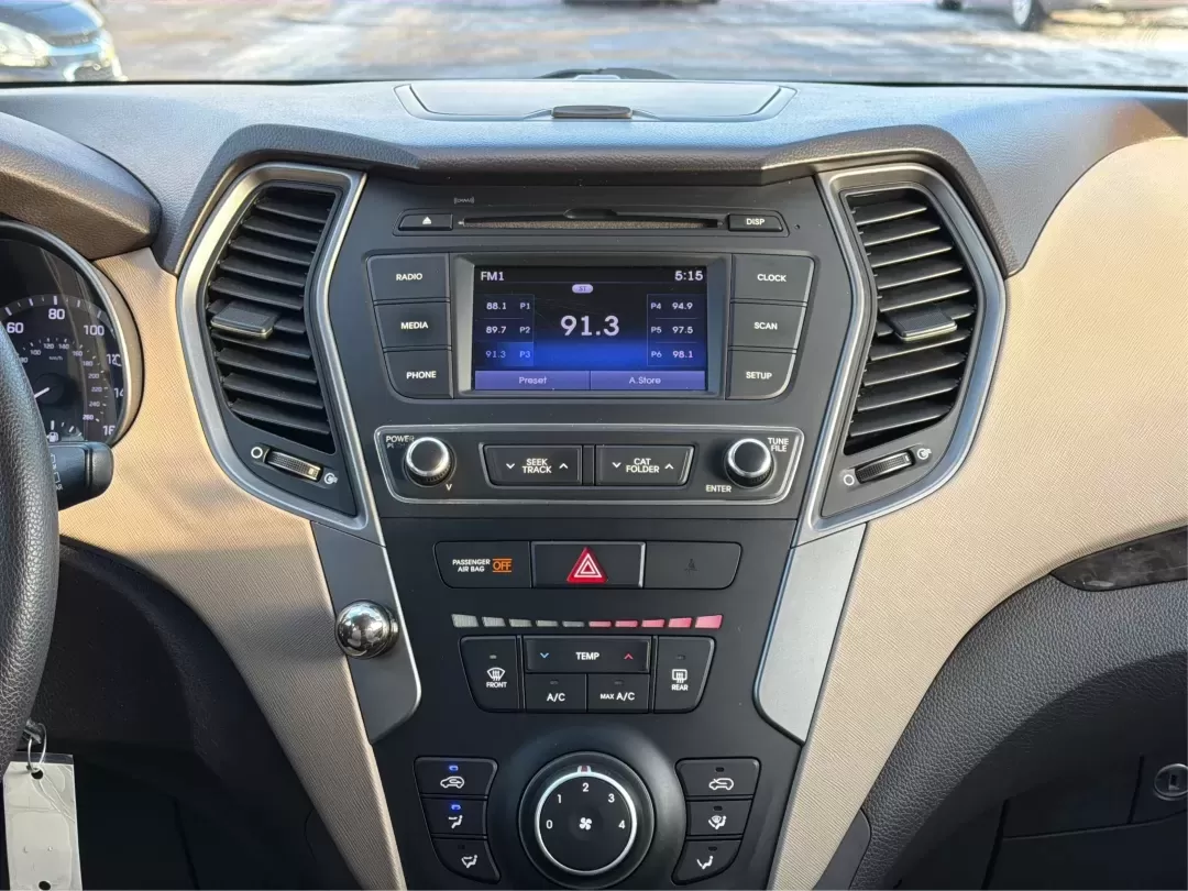 2017 Hyundai Santa Fe 2.4L (5NMZT3LBXHH) with an Theta II 2.4L I-4 gasoline direct injection engine, located at 880 E. National Road, Vandalia, OH, 45377, (937) 908-9800, 39.891918, -84.183594 - 2017 Hyundai Santa Fe 2.4L - Photo#12