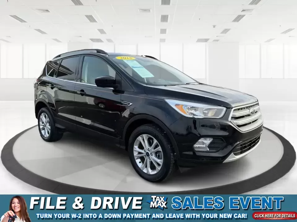 2018 Ford Escape SE (1FMCU9GD6JU) with an 1.5L L4 DOHC 16V engine, 6A transmission, located at 1184 Kauffman Ave, Fairborn, OH, 45324, (937) 908-9800, 39.807072, -84.030914 - Are you looking for the perfect vehicle that can handle your busy lifestyle while keeping you comfortable and safe? Look no further than this 2018 Ford Escape SE at Advantage Car and Credit in Piqua, OH. This versatile SUV is ideal for families on the go, weekend adventurers, and even commuters who - Photo#0
