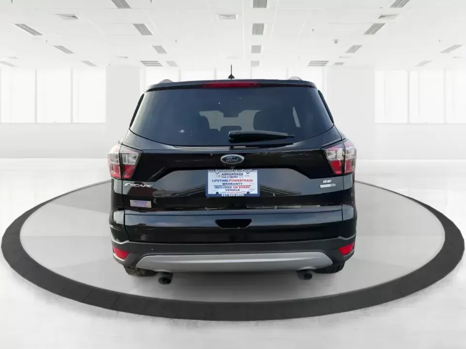 2018 Ford Escape SE (1FMCU9GD6JU) with an 1.5L L4 DOHC 16V engine, 6A transmission, located at 1184 Kauffman Ave, Fairborn, OH, 45324, (937) 908-9800, 39.807072, -84.030914 - Are you looking for the perfect vehicle that can handle your busy lifestyle while keeping you comfortable and safe? Look no further than this 2018 Ford Escape SE at Advantage Car and Credit in Piqua, OH. This versatile SUV is ideal for families on the go, weekend adventurers, and even commuters who - Photo#3