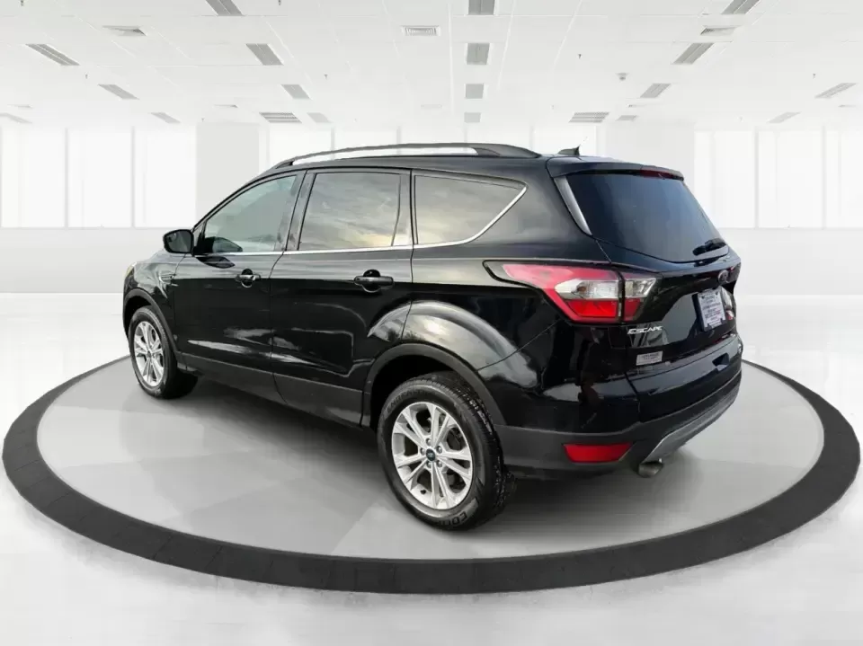 2018 Ford Escape SE (1FMCU9GD6JU) with an 1.5L L4 DOHC 16V engine, 6A transmission, located at 1184 Kauffman Ave, Fairborn, OH, 45324, (937) 908-9800, 39.807072, -84.030914 - Are you looking for the perfect vehicle that can handle your busy lifestyle while keeping you comfortable and safe? Look no further than this 2018 Ford Escape SE at Advantage Car and Credit in Piqua, OH. This versatile SUV is ideal for families on the go, weekend adventurers, and even commuters who - Photo#4