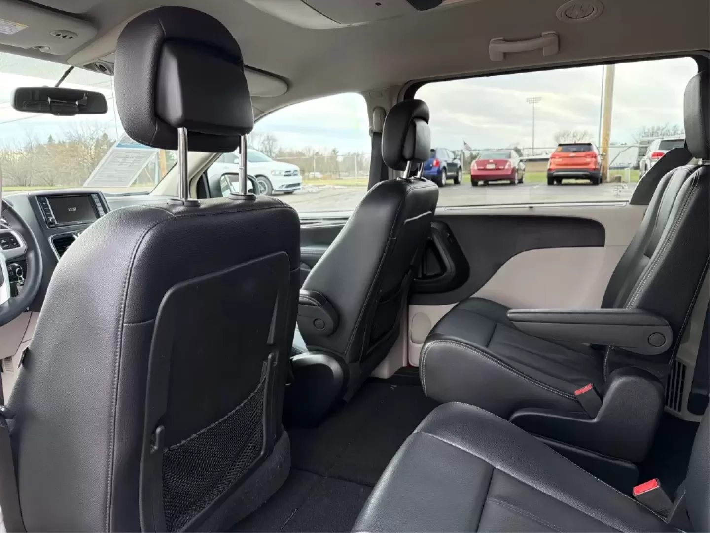 2015 Chrysler Town and Country Touring (2C4RC1BG4FR) with an 3.6L V-6 DOHC engine, located at 8750 N County Rd 25A, Piqua, OH, 45356, (937) 908-9800, 40.164391, -84.232513 - If you're searching for the perfect family vehicle that combines spaciousness, comfort, and advanced features, look no further than the 2015 Chrysler Town and Country Touring van available at Advantage Car and Credit in Piqua, OH. This passenger van is an ideal solution for growing families who ne - Photo#10