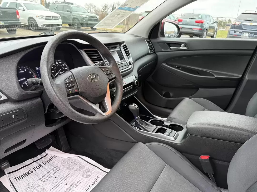 2018 Hyundai Tucson SE (KM8J23A42JU) with an Nu 2L I-4 gasoline direct injection engine, located at 8750 N County Rd 25A, Piqua, OH, 45356, (937) 908-9800, 40.164391, -84.232513 - **Explore the Open Road with the 2018 Hyundai Tucson at Advantage Car and Credit Piqua, OH**<br /> <br /> Are you ready to elevate your driving experience? Whether you're a growing family in need of extra space, a daily commuter looking for efficiency, or an adventure seeker craving weekend road tr - Photo#9