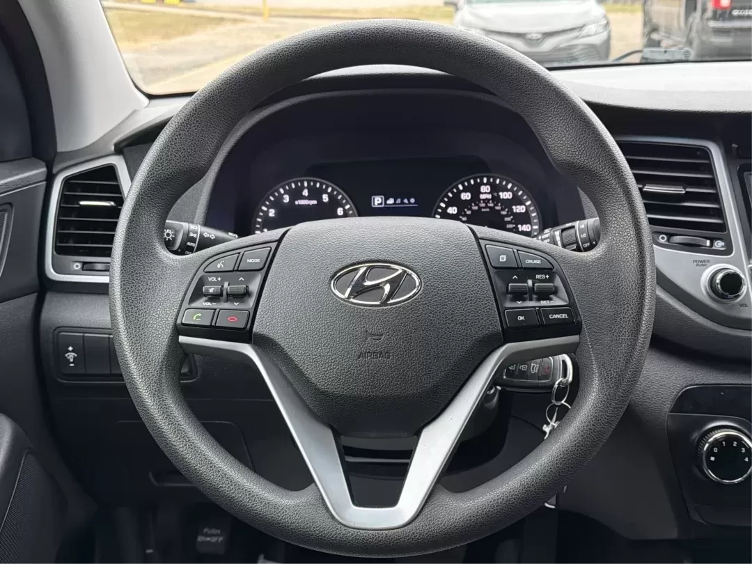 2018 Hyundai Tucson SE (KM8J23A42JU) with an Nu 2L I-4 gasoline direct injection engine, located at 8750 N County Rd 25A, Piqua, OH, 45356, (937) 908-9800, 40.164391, -84.232513 - **Explore the Open Road with the 2018 Hyundai Tucson at Advantage Car and Credit Piqua, OH**<br /> <br /> Are you ready to elevate your driving experience? Whether you're a growing family in need of extra space, a daily commuter looking for efficiency, or an adventure seeker craving weekend road tr - Photo#16