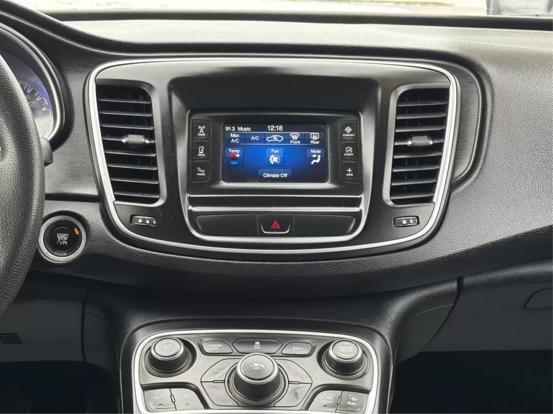 2015 Chrysler 200 Limited (1C3CCCAB7FN) with an Other engine, located at 1099 N County Rd 25A , Troy, OH, 45373, (937) 908-9800, 40.057079, -84.212883 - **Discover the Perfect Blend of Style and Comfort with the 2015 Chrysler 200 at Advantage Car and Credit - Troy!**<br /> <br /> Are you seeking a dependable sedan that can comfortably handle your daily commute while also adapting to weekend adventures? Look no further than this stunning 2015 Chrysle - Photo#12