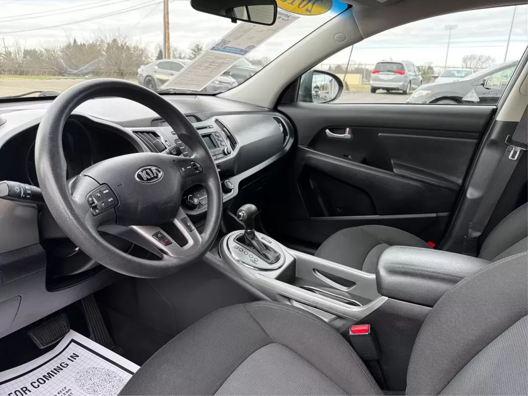 2015 Kia Sportage LX (KNDPBCAC6F7) with an Other engine, located at 4508 South Dixie Dr, Moraine, OH, 45439, (937) 908-9800, 39.689976, -84.218452 - **Unleash Your Adventurous Spirit with the 2015 Kia Sportage LX in Moraine, OH!**<br /> <br /> Are you ready to elevate your lifestyle with a vehicle that perfectly marries practicality and style? The 2015 Kia Sportage LX is your ticket to unforgettable weekend adventures, family outings, and daily - Photo#9