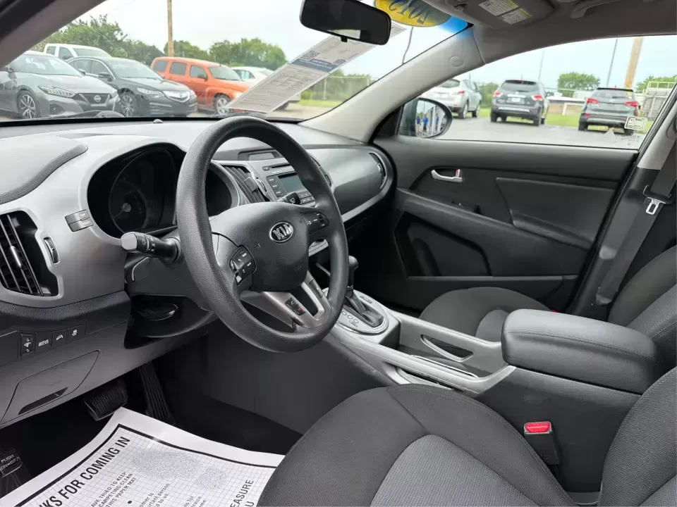2015 Kia Sportage LX AWD (KNDPBCAC6F7) with an 2.4L V6 DOHC 24V engine, 6-Speed Automatic transmission, located at 4508 South Dixie Dr, Moraine, OH, 45439, (937) 908-9800, 39.689976, -84.218452 - Ready for weekend getaways to Caesar Creek, snowy school runs, or a daily commute down I75 and SR725? This **2015 Kia Sportage LX AWD** is the kind of practical crossover that fits real life in Moraine-easy to park, comfortable for five, and confident when the weather turns. Finished in **Mineral Si - Photo#9