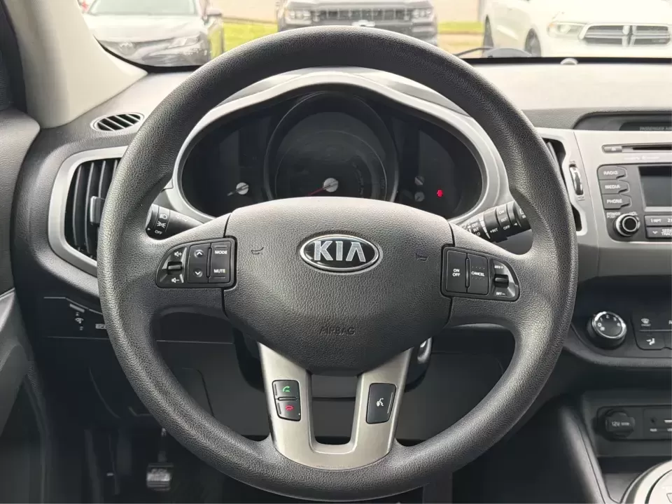 2015 Kia Sportage LX AWD (KNDPBCAC6F7) with an 2.4L V6 DOHC 24V engine, 6-Speed Automatic transmission, located at 4508 South Dixie Dr, Moraine, OH, 45439, (937) 908-9800, 39.689976, -84.218452 - Ready for weekend getaways to Caesar Creek, snowy school runs, or a daily commute down I75 and SR725? This **2015 Kia Sportage LX AWD** is the kind of practical crossover that fits real life in Moraine-easy to park, comfortable for five, and confident when the weather turns. Finished in **Mineral Si - Photo#16