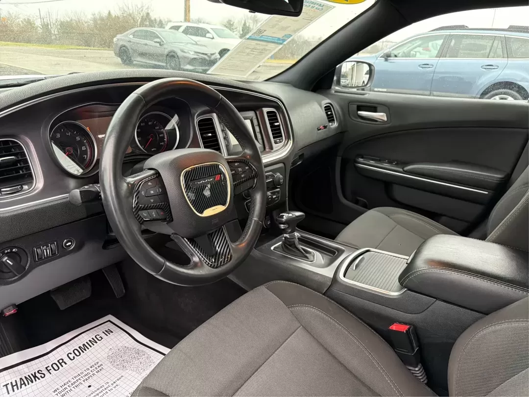 2015 Dodge Charger SE (2C3CDXBG3FH) with an 3.6L V-6 DOHC engine, located at 8750 N County Rd 25A, Piqua, OH, 45356, (937) 908-9800, 40.164391, -84.232513 - Experience the thrill of the open road with the 2015 Dodge Charger SE, a powerful sedan that perfectly balances performance and comfort. This vehicle is an ideal choice for those looking to elevate their daily commute or make unforgettable road trips. Whether you're navigating through the charming s - Photo#9