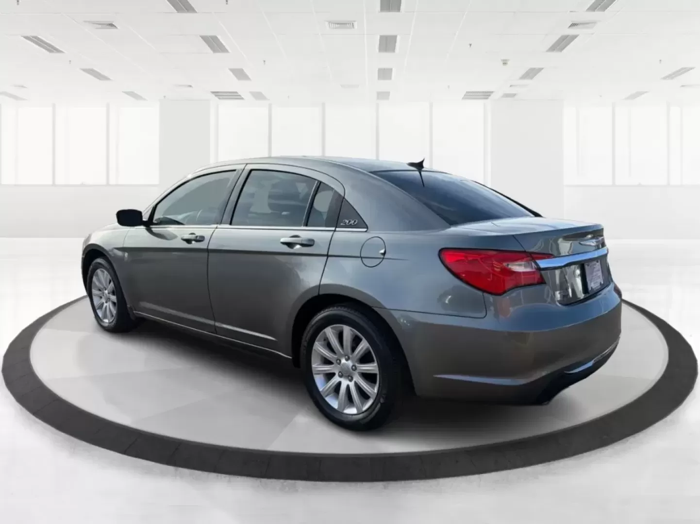 2012 Chrysler 200 Touring (1C3CCBBG2CN) with an 3.6L V6 DOHC 24V FFV engine, 6-Speed Automatic transmission, located at 880 E. National Road, Vandalia, OH, 45377, (937) 908-9800, 39.891918, -84.183594 - Discover the perfect blend of style, comfort, and affordability with the 2012 Chrysler 200 Touring sedan, available now at Advantage Car and Credit in Vandalia, OH. This vehicle is ideal for budget-conscious buyers seeking a reliable ride for daily commutes or weekend adventures. With its sleek Tung - Photo#4
