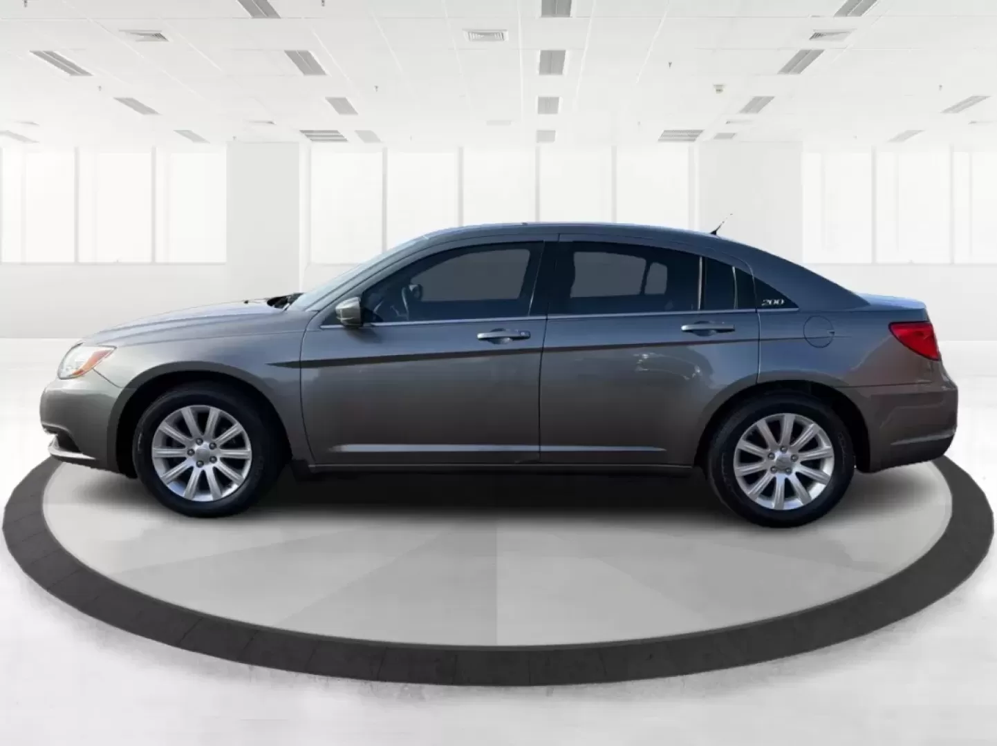 2012 Chrysler 200 Touring (1C3CCBBG2CN) with an 3.6L V6 DOHC 24V FFV engine, 6-Speed Automatic transmission, located at 880 E. National Road, Vandalia, OH, 45377, (937) 908-9800, 39.891918, -84.183594 - Discover the perfect blend of style, comfort, and affordability with the 2012 Chrysler 200 Touring sedan, available now at Advantage Car and Credit in Vandalia, OH. This vehicle is ideal for budget-conscious buyers seeking a reliable ride for daily commutes or weekend adventures. With its sleek Tung - Photo#5