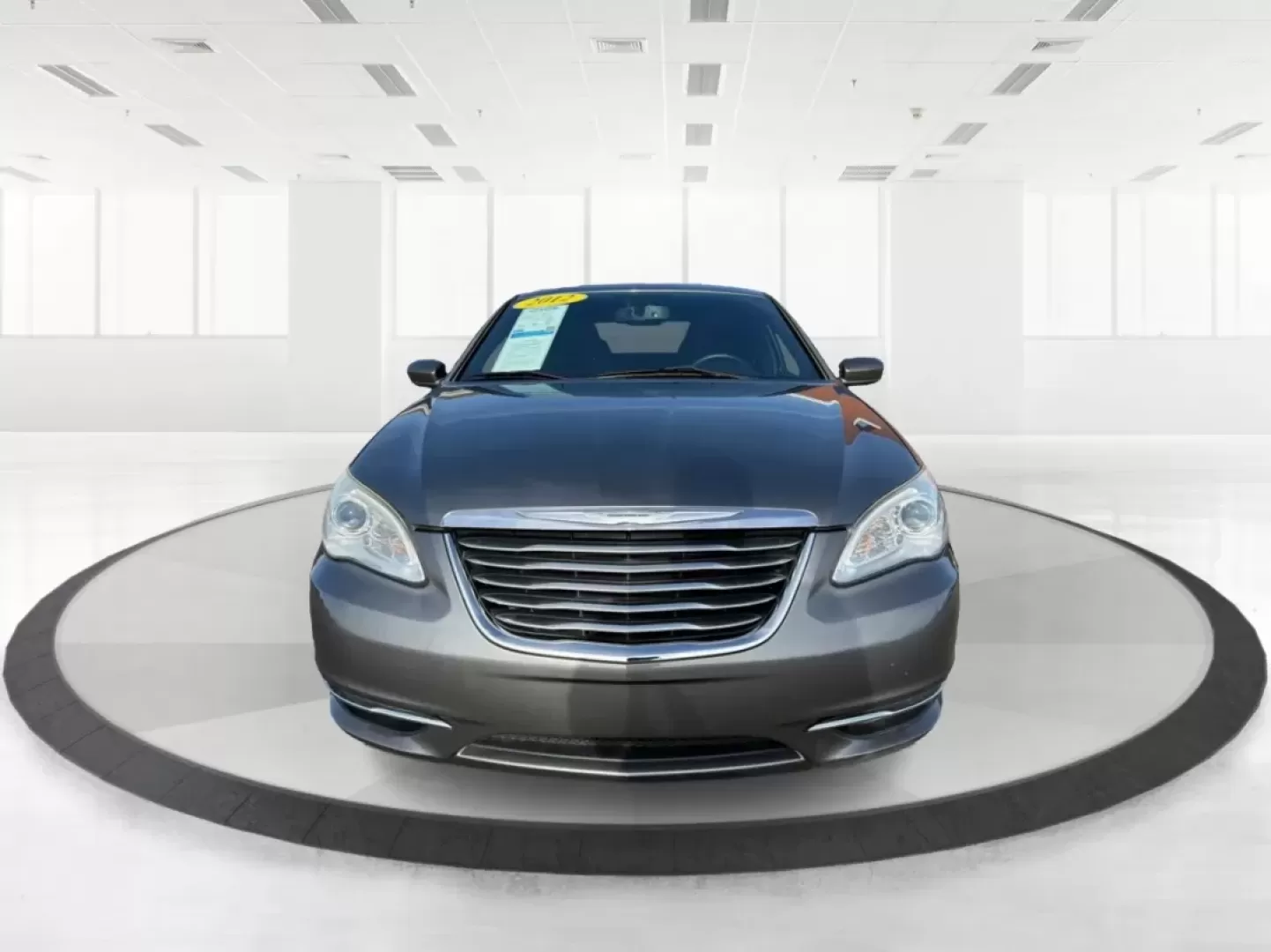 2012 Chrysler 200 Touring (1C3CCBBG2CN) with an 3.6L V6 DOHC 24V FFV engine, 6-Speed Automatic transmission, located at 880 E. National Road, Vandalia, OH, 45377, (937) 908-9800, 39.891918, -84.183594 - Discover the perfect blend of style, comfort, and affordability with the 2012 Chrysler 200 Touring sedan, available now at Advantage Car and Credit in Vandalia, OH. This vehicle is ideal for budget-conscious buyers seeking a reliable ride for daily commutes or weekend adventures. With its sleek Tung - Photo#7