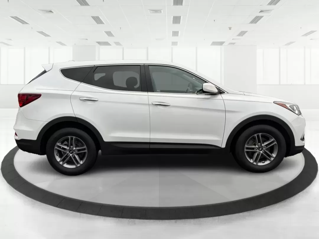 2017 Hyundai Santa Fe 2.4L (5NMZTDLB2HH) with an Theta II 2.4L I-4 gasoline direct injection engine, located at 1951 S Dayton Lakeview Rd., New Carlisle, OH, 45344, (937) 908-9800, 39.890999, -84.050255 - **Elevate Your Family Adventures with the 2017 Hyundai Santa Fe at Advantage Car and Credit!**<br /> <br /> Are you searching for the perfect vehicle to accommodate your growing family or to enhance your weekend getaways? Look no further! The 2017 Hyundai Santa Fe is a versatile and spacious SUV des - Photo#1