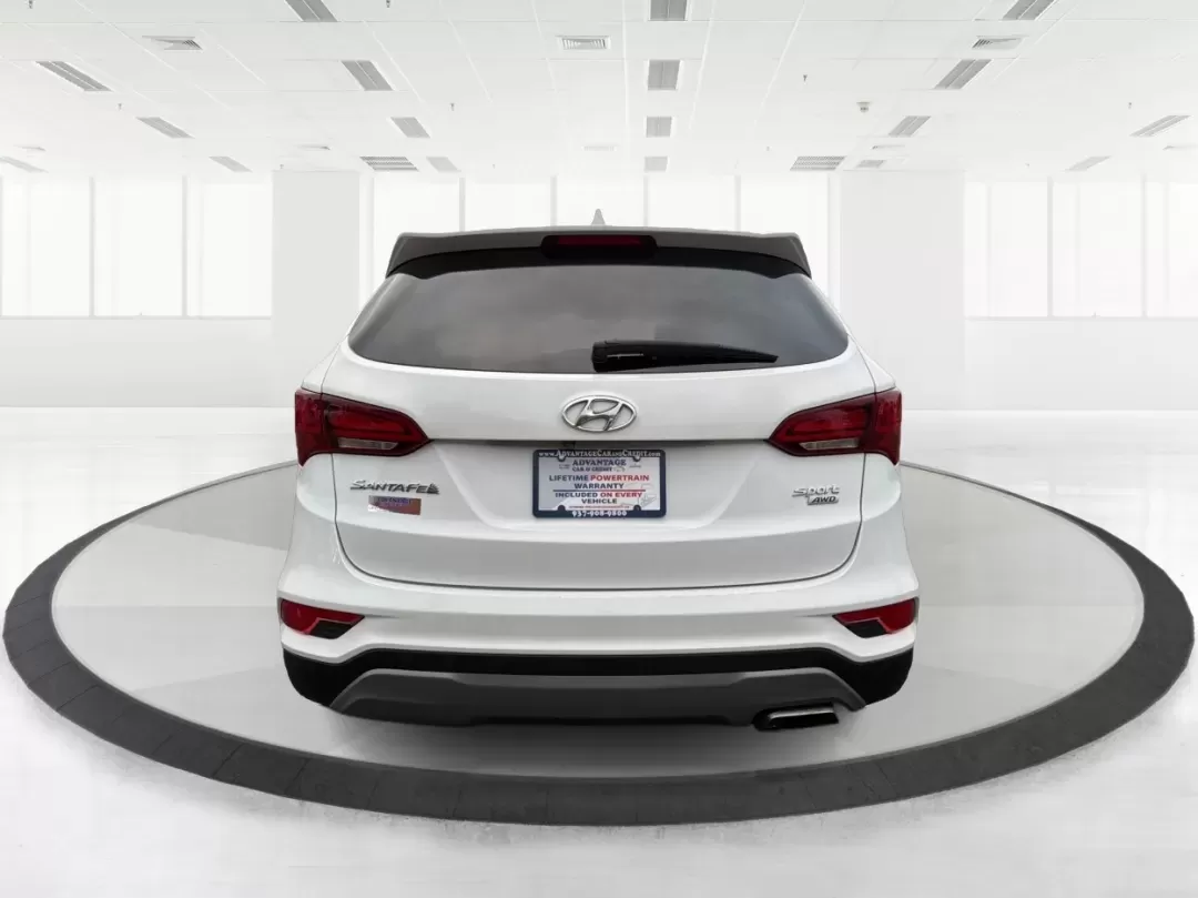 2017 Hyundai Santa Fe 2.4L (5NMZTDLB2HH) with an Theta II 2.4L I-4 gasoline direct injection engine, located at 1951 S Dayton Lakeview Rd., New Carlisle, OH, 45344, (937) 908-9800, 39.890999, -84.050255 - **Elevate Your Family Adventures with the 2017 Hyundai Santa Fe at Advantage Car and Credit!**<br /> <br /> Are you searching for the perfect vehicle to accommodate your growing family or to enhance your weekend getaways? Look no further! The 2017 Hyundai Santa Fe is a versatile and spacious SUV des - Photo#3