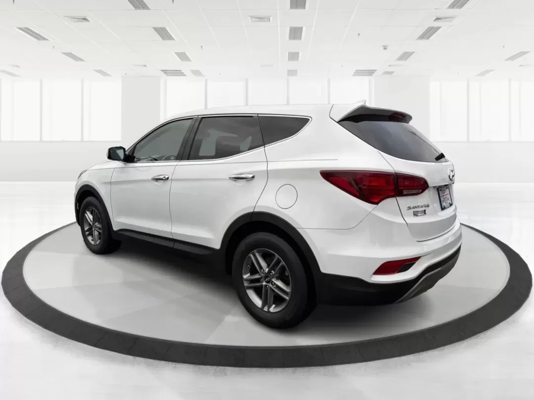 2017 Hyundai Santa Fe 2.4L (5NMZTDLB2HH) with an Theta II 2.4L I-4 gasoline direct injection engine, located at 1951 S Dayton Lakeview Rd., New Carlisle, OH, 45344, (937) 908-9800, 39.890999, -84.050255 - **Elevate Your Family Adventures with the 2017 Hyundai Santa Fe at Advantage Car and Credit!**<br /> <br /> Are you searching for the perfect vehicle to accommodate your growing family or to enhance your weekend getaways? Look no further! The 2017 Hyundai Santa Fe is a versatile and spacious SUV des - Photo#4