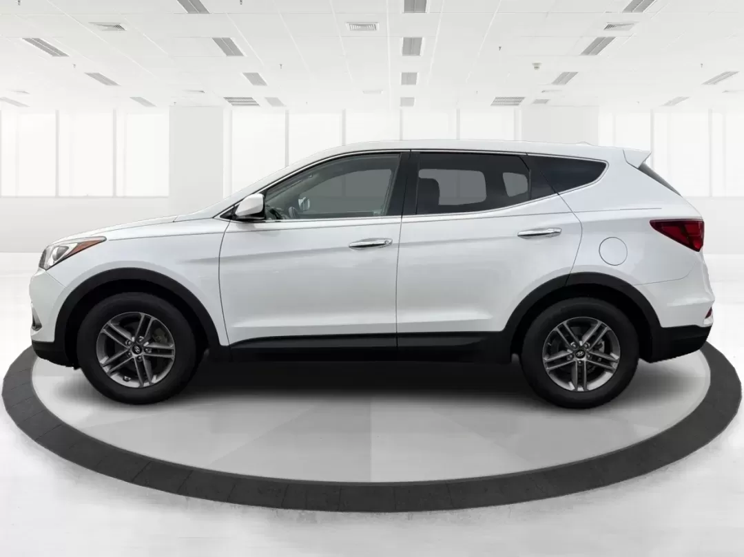 2017 Hyundai Santa Fe 2.4L (5NMZTDLB2HH) with an Theta II 2.4L I-4 gasoline direct injection engine, located at 1951 S Dayton Lakeview Rd., New Carlisle, OH, 45344, (937) 908-9800, 39.890999, -84.050255 - **Elevate Your Family Adventures with the 2017 Hyundai Santa Fe at Advantage Car and Credit!**<br /> <br /> Are you searching for the perfect vehicle to accommodate your growing family or to enhance your weekend getaways? Look no further! The 2017 Hyundai Santa Fe is a versatile and spacious SUV des - Photo#5