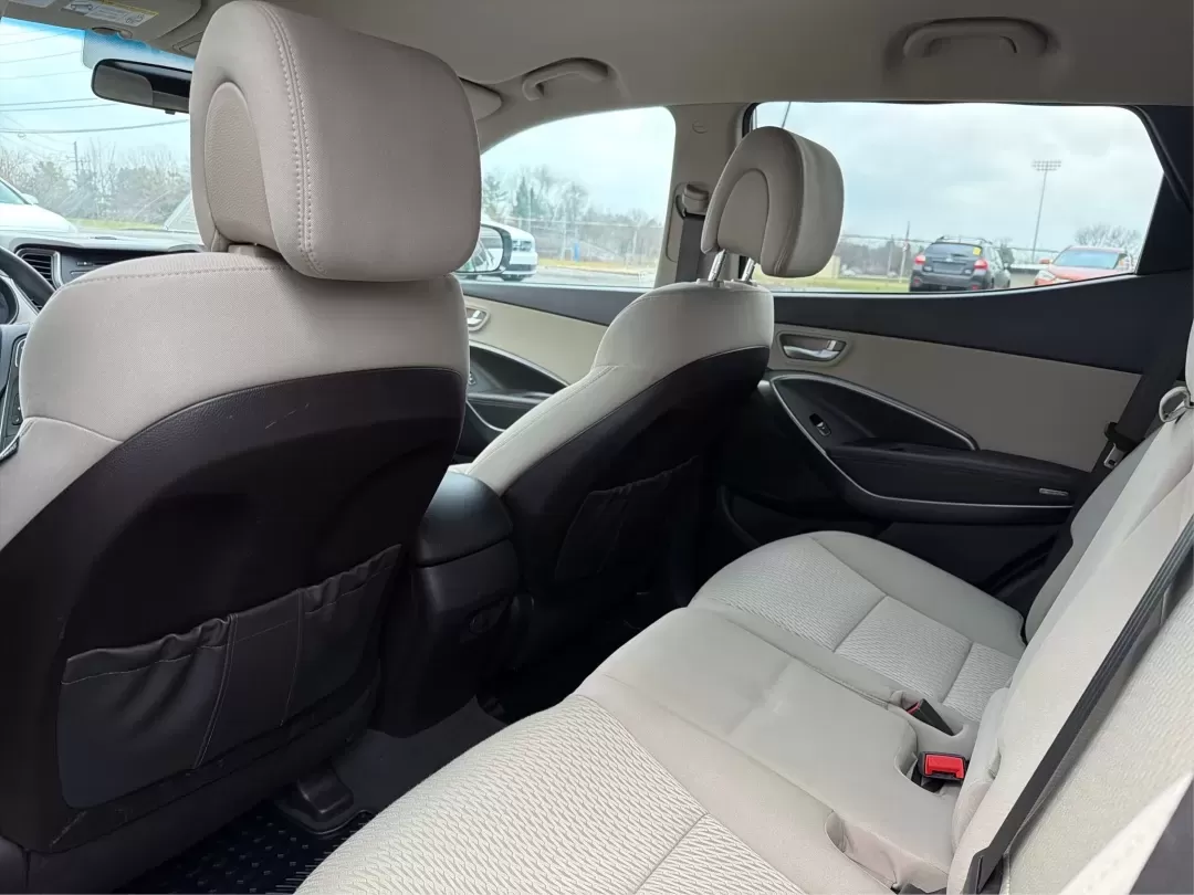 2017 Hyundai Santa Fe 2.4L (5NMZTDLB2HH) with an Theta II 2.4L I-4 gasoline direct injection engine, located at 1951 S Dayton Lakeview Rd., New Carlisle, OH, 45344, (937) 908-9800, 39.890999, -84.050255 - **Elevate Your Family Adventures with the 2017 Hyundai Santa Fe at Advantage Car and Credit!**<br /> <br /> Are you searching for the perfect vehicle to accommodate your growing family or to enhance your weekend getaways? Look no further! The 2017 Hyundai Santa Fe is a versatile and spacious SUV des - Photo#10