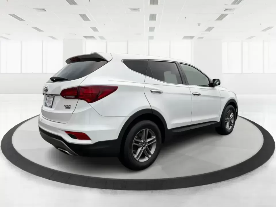 2017 Hyundai Santa Fe 2.4L (5NMZTDLB2HH) with an Theta II 2.4L I-4 gasoline direct injection engine, 6A transmission, located at 4508 South Dixie Dr, Moraine, OH, 45439, (937) 908-9800, 39.689976, -84.218452 - **Elevate Your Family Adventures with the 2017 Hyundai Santa Fe at Advantage Car and Credit!**<br /> <br /> Are you searching for the perfect vehicle to accommodate your growing family or to enhance your weekend getaways? Look no further! The 2017 Hyundai Santa Fe is a versatile and spacious SUV des - Photo#2