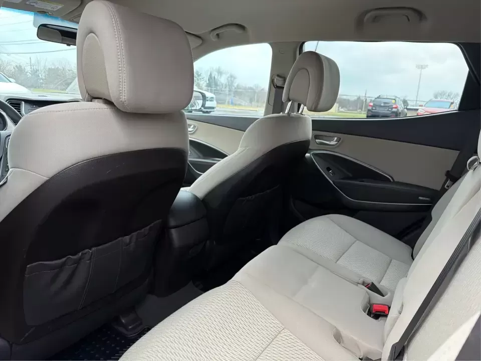 2017 Hyundai Santa Fe 2.4L (5NMZTDLB2HH) with an Theta II 2.4L I-4 gasoline direct injection engine, 6A transmission, located at 4508 South Dixie Dr, Moraine, OH, 45439, (937) 908-9800, 39.689976, -84.218452 - **Elevate Your Family Adventures with the 2017 Hyundai Santa Fe at Advantage Car and Credit!**<br /> <br /> Are you searching for the perfect vehicle to accommodate your growing family or to enhance your weekend getaways? Look no further! The 2017 Hyundai Santa Fe is a versatile and spacious SUV des - Photo#10