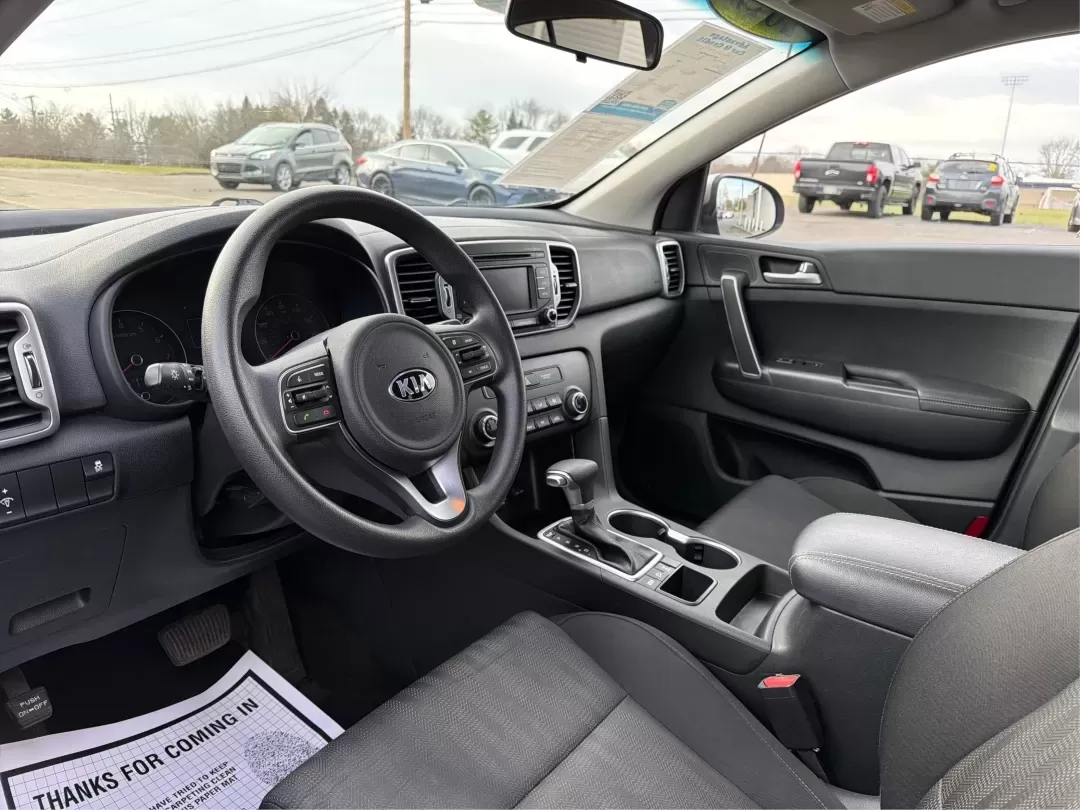 2017 Kia Sportage LX (KNDPMCAC2H7) with an Theta II 2.4L I-4 gasoline direct injection engine, located at 401 Woodman Dr, Riverside, OH, 45431, (937) 908-9800, 39.760899, -84.123421 - **Adventure Awaits with the 2017 Kia Sportage LX at Advantage Car and Credit - Riverside!**<br /> <br /> Are you looking for a versatile crossover that seamlessly fits into your active lifestyle? The 2017 Kia Sportage LX is your ticket to weekend adventures, family road trips, and daily commutes. Wi - Photo#9