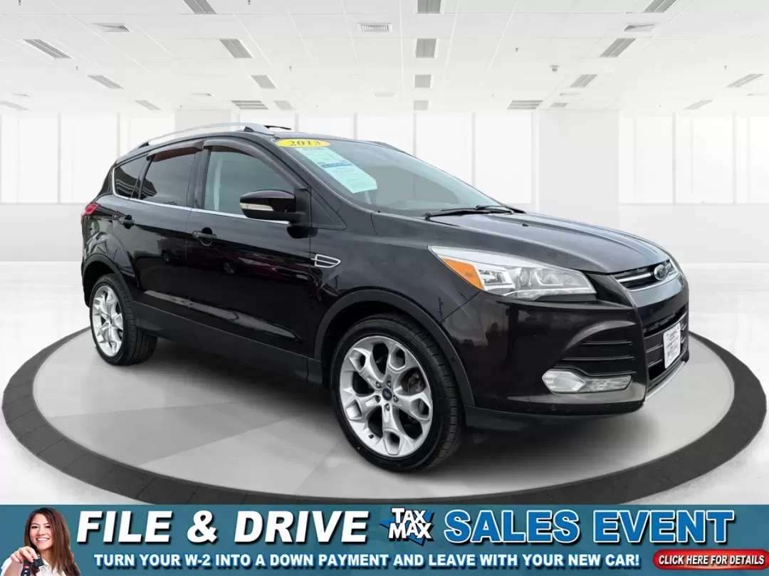 2013 Ford Escape Titanium (1FMCU9J90DU) with an EcoBoost 2L I-4 gasoline direct injection engine, located at 401 Woodman Dr, Riverside, OH, 45431, (937) 908-9800, 39.760899, -84.123421 - **Explore the Open Road with Confidence: 2013 Ford Escape Titanium at Advantage Car and Credit!**<br /> <br /> Are you ready for your next adventure? Whether you're taking the kids to soccer practice, planning weekend getaways, or commuting to work, this 2013 Ford Escape Titanium is the perfect comp - Photo#0