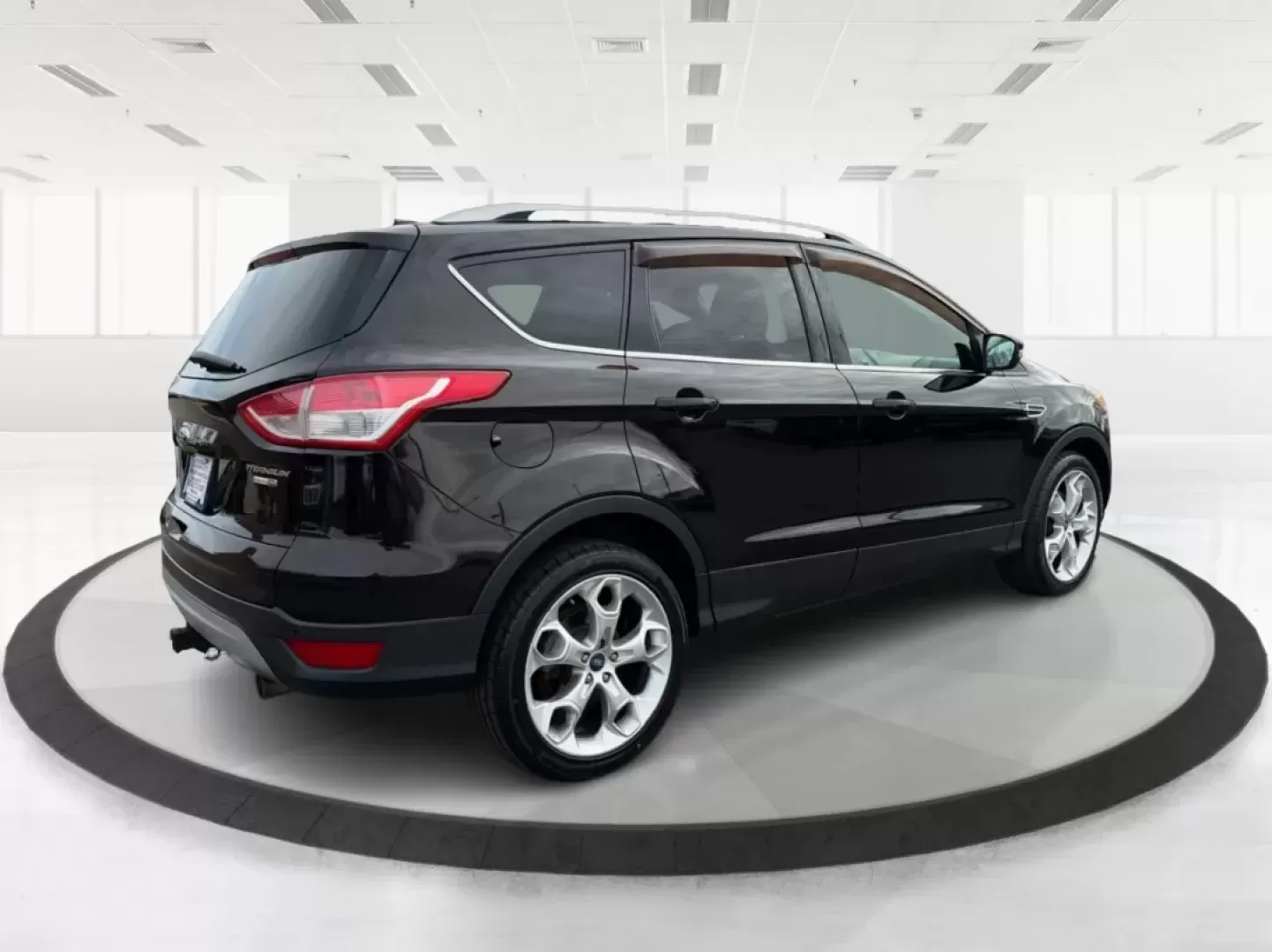 2013 Ford Escape Titanium (1FMCU9J90DU) with an EcoBoost 2L I-4 gasoline direct injection engine, located at 401 Woodman Dr, Riverside, OH, 45431, (937) 908-9800, 39.760899, -84.123421 - **Explore the Open Road with Confidence: 2013 Ford Escape Titanium at Advantage Car and Credit!**<br /> <br /> Are you ready for your next adventure? Whether you're taking the kids to soccer practice, planning weekend getaways, or commuting to work, this 2013 Ford Escape Titanium is the perfect comp - Photo#2