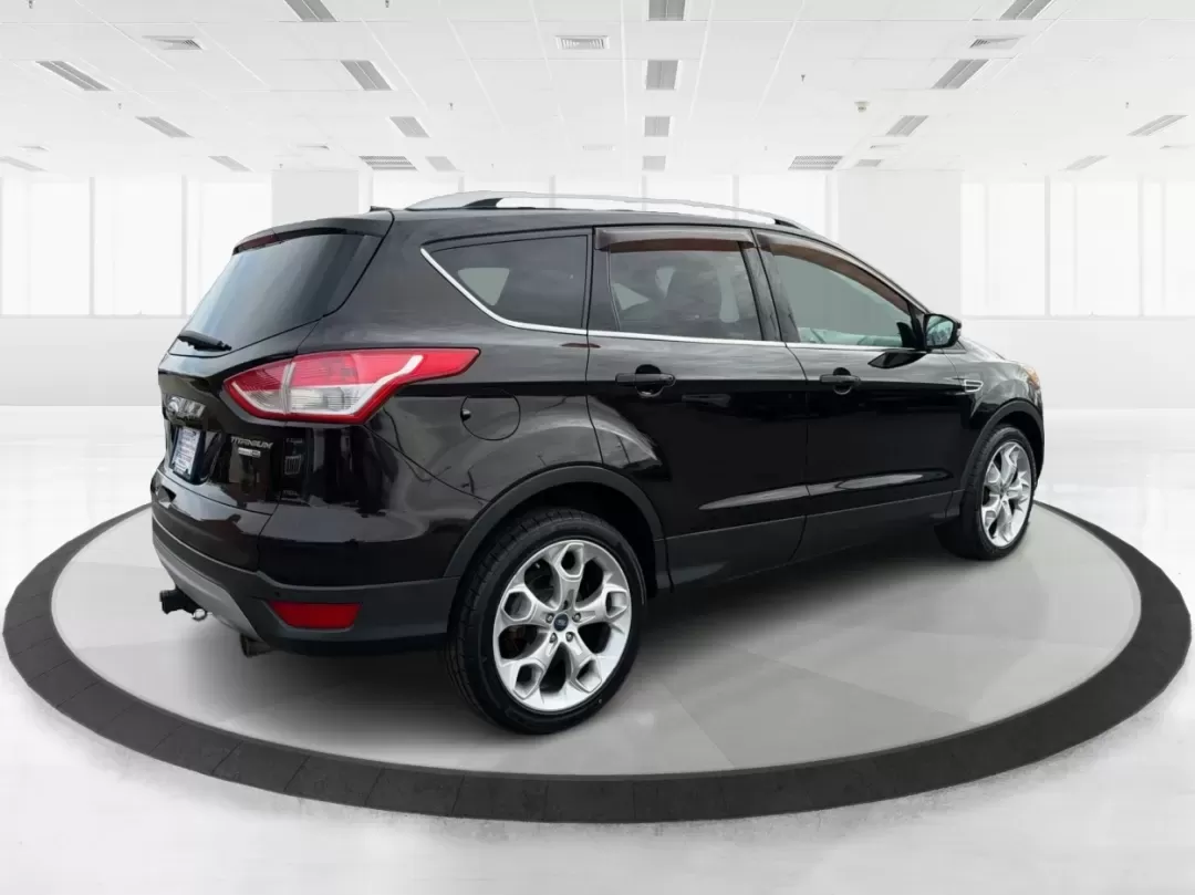 2013 Ford Escape Titanium (1FMCU9J90DU) with an EcoBoost 2L I-4 gasoline direct injection engine, located at 401 Woodman Dr, Riverside, OH, 45431, (937) 908-9800, 39.760899, -84.123421 - **Explore the Open Road with Confidence: 2013 Ford Escape Titanium at Advantage Car and Credit!**<br /> <br /> Are you ready for your next adventure? Whether you're taking the kids to soccer practice, planning weekend getaways, or commuting to work, this 2013 Ford Escape Titanium is the perfect comp - Photo#2