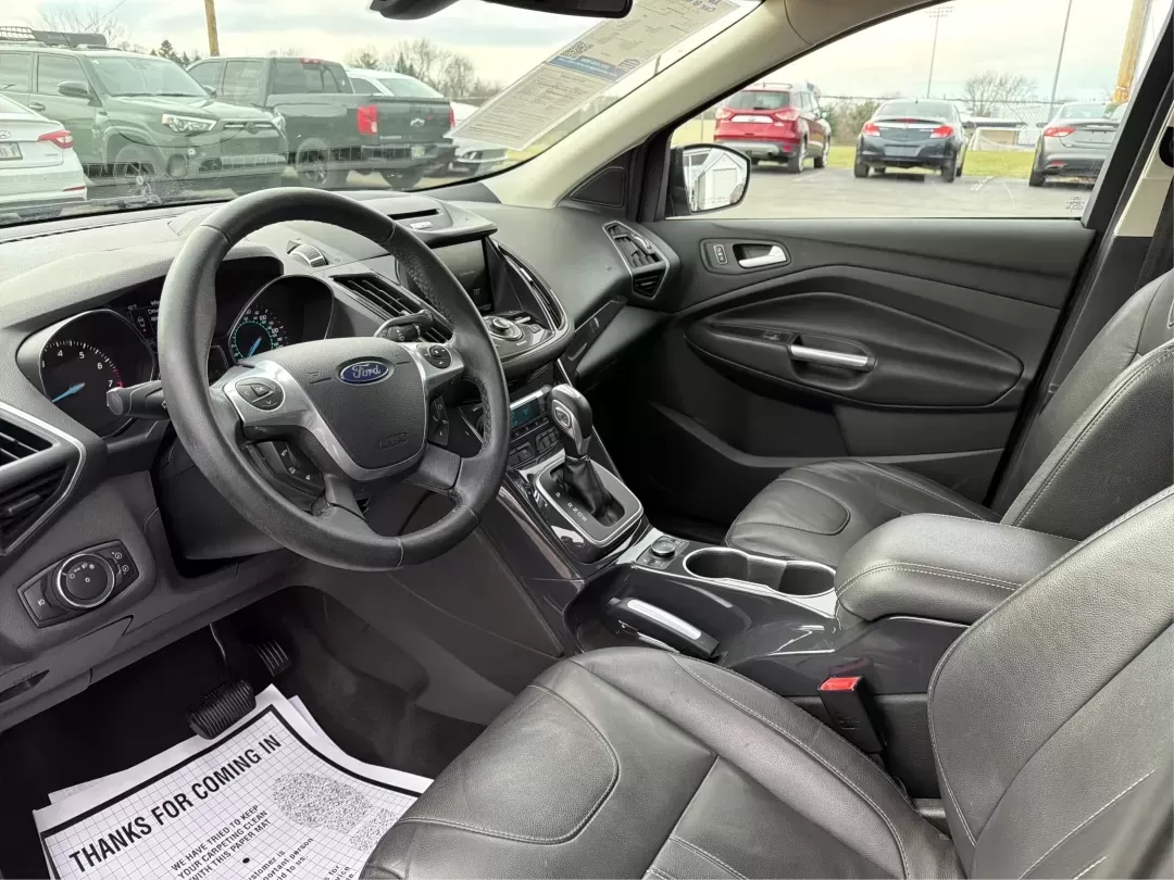 2013 Ford Escape Titanium (1FMCU9J90DU) with an EcoBoost 2L I-4 gasoline direct injection engine, located at 401 Woodman Dr, Riverside, OH, 45431, (937) 908-9800, 39.760899, -84.123421 - **Explore the Open Road with Confidence: 2013 Ford Escape Titanium at Advantage Car and Credit!**<br /> <br /> Are you ready for your next adventure? Whether you're taking the kids to soccer practice, planning weekend getaways, or commuting to work, this 2013 Ford Escape Titanium is the perfect comp - Photo#9