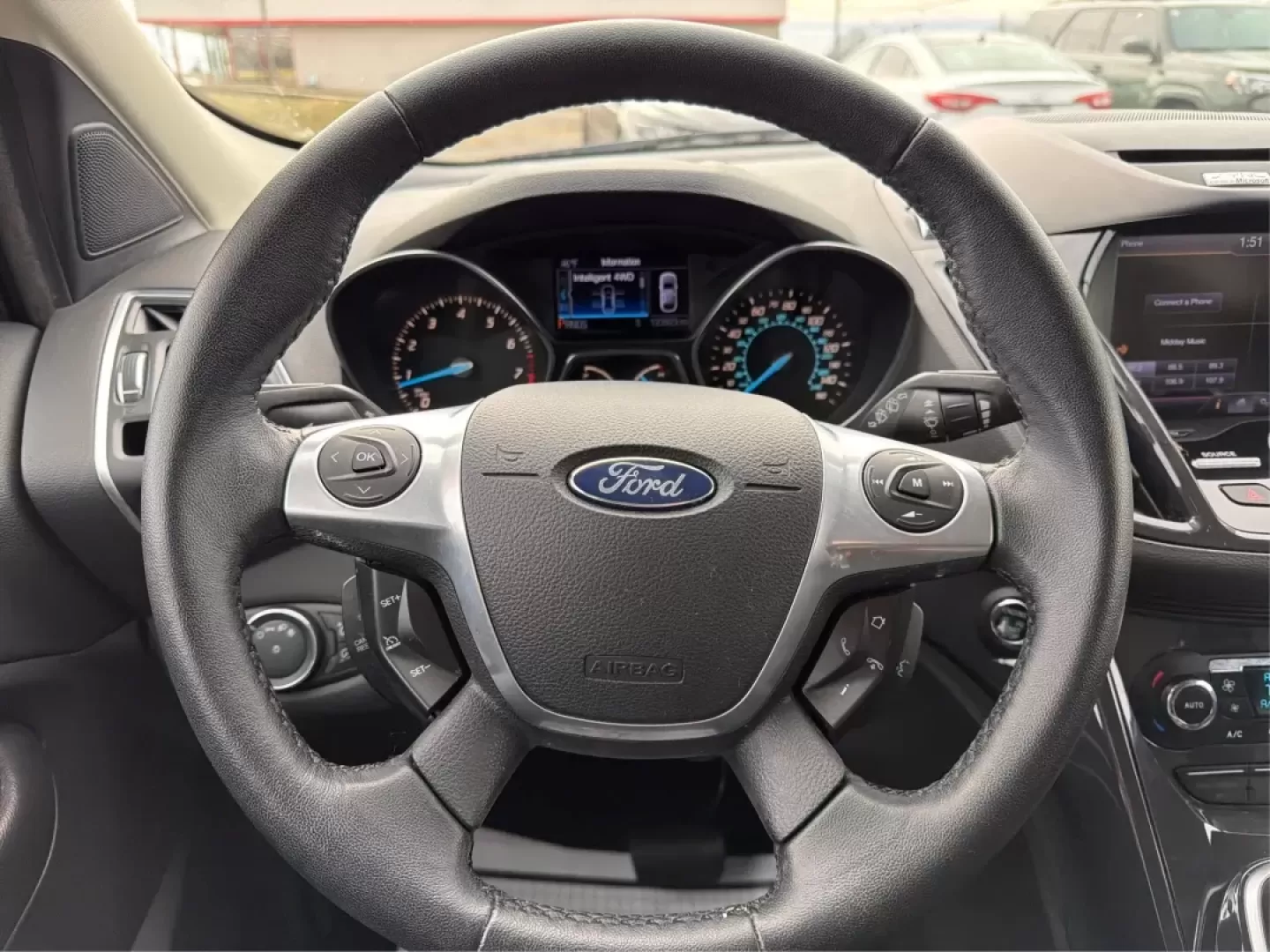 2013 Ford Escape Titanium (1FMCU9J90DU) with an EcoBoost 2L I-4 gasoline direct injection engine, located at 401 Woodman Dr, Riverside, OH, 45431, (937) 908-9800, 39.760899, -84.123421 - **Explore the Open Road with Confidence: 2013 Ford Escape Titanium at Advantage Car and Credit!**<br /> <br /> Are you ready for your next adventure? Whether you're taking the kids to soccer practice, planning weekend getaways, or commuting to work, this 2013 Ford Escape Titanium is the perfect comp - Photo#16