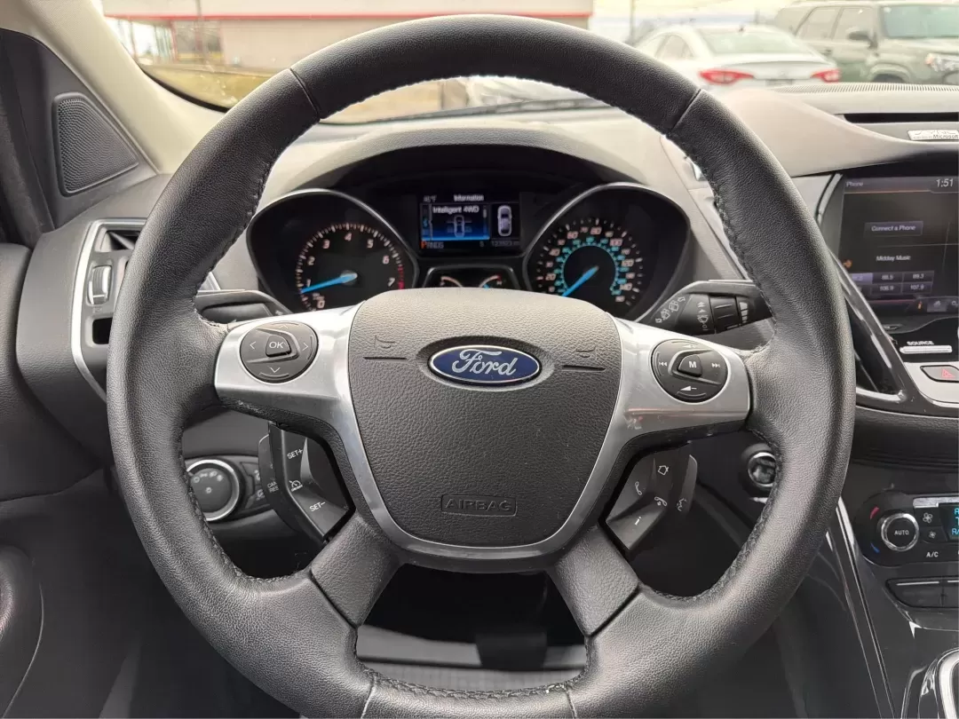 2013 Ford Escape Titanium (1FMCU9J90DU) with an EcoBoost 2L I-4 gasoline direct injection engine, located at 401 Woodman Dr, Riverside, OH, 45431, (937) 908-9800, 39.760899, -84.123421 - **Explore the Open Road with Confidence: 2013 Ford Escape Titanium at Advantage Car and Credit!**<br /> <br /> Are you ready for your next adventure? Whether you're taking the kids to soccer practice, planning weekend getaways, or commuting to work, this 2013 Ford Escape Titanium is the perfect comp - Photo#16