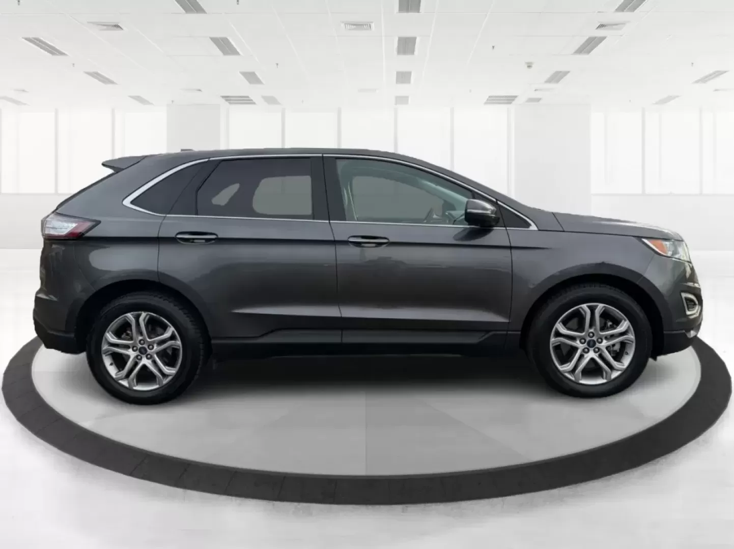 2015 Ford Edge Titanium (2FMTK3K89FB) with an 3.5L V6 DOHC 24V engine, 6A transmission, located at 8750 N County Rd 25A, Piqua, OH, 45356, (937) 908-9800, 40.164391, -84.232513 - **Explore New Horizons with the 2015 Ford Edge Titanium at Advantage Car and Credit**<br /> <br /> If you're on the hunt for a versatile SUV that can handle anything from daily commutes to weekend adventures, look no further than the 2015 Ford Edge Titanium. This sporty utility vehicle is the perfec - Photo#1