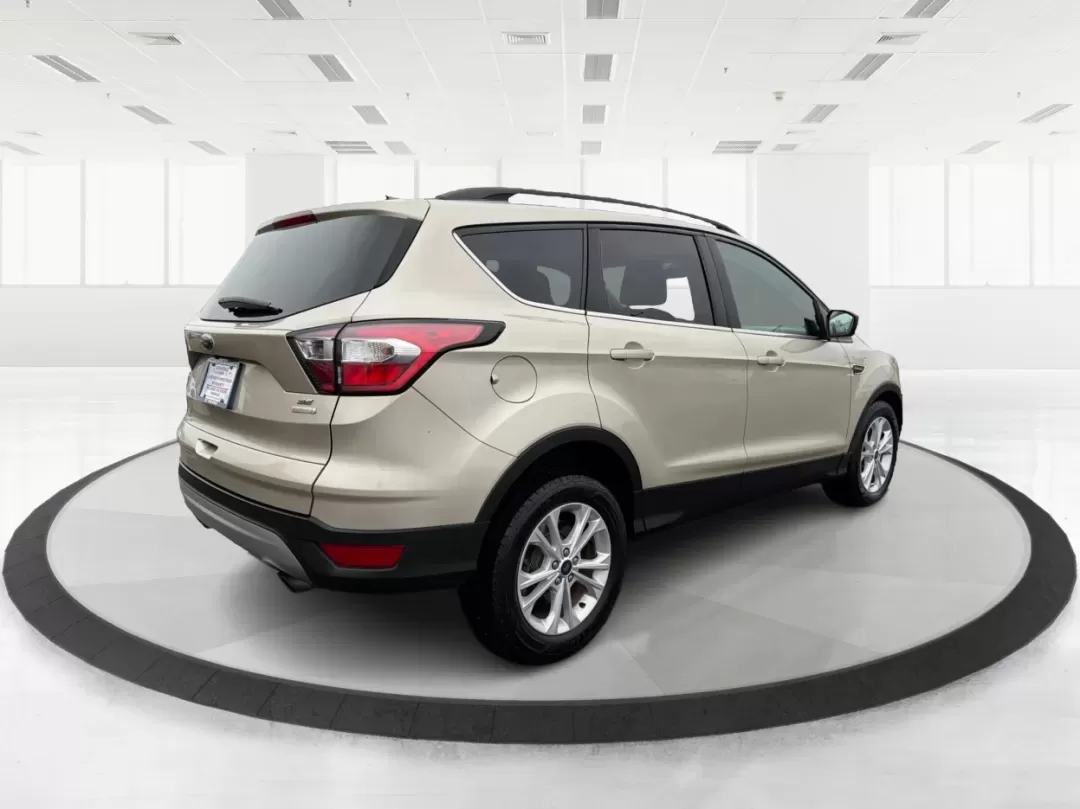 2017 Ford Escape SE (1FMCU0GD1HU) with an Other engine, located at 4508 South Dixie Dr, Moraine, OH, 45439, (937) 908-9800, 39.689976, -84.218452 - Are you ready to elevate your driving experience? Whether you're navigating daily commutes, embarking on weekend getaways, or simply enjoying family outings, the 2017 Ford Escape SE is the perfect companion for your active lifestyle. This well-appointed SUV promises versatility and comfort, making i - Photo#2