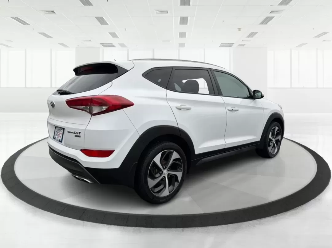 2016 Hyundai Tucson Sport (KM8J3CA26GU) with an 1.6L I-4 gasoline direct injection engine, located at 1230 East Main St, Xenia, OH, 45385, (937) 908-9800, 39.688026, -83.910172 - Discover a world of adventure with the 2016 Hyundai Tucson Sport, the perfect SUV for active families and weekend explorers alike! With its stylish Dazzling White exterior and spacious interior, this vehicle is designed for those who crave both comfort and versatility. Whether you're navigating thro - Photo#2