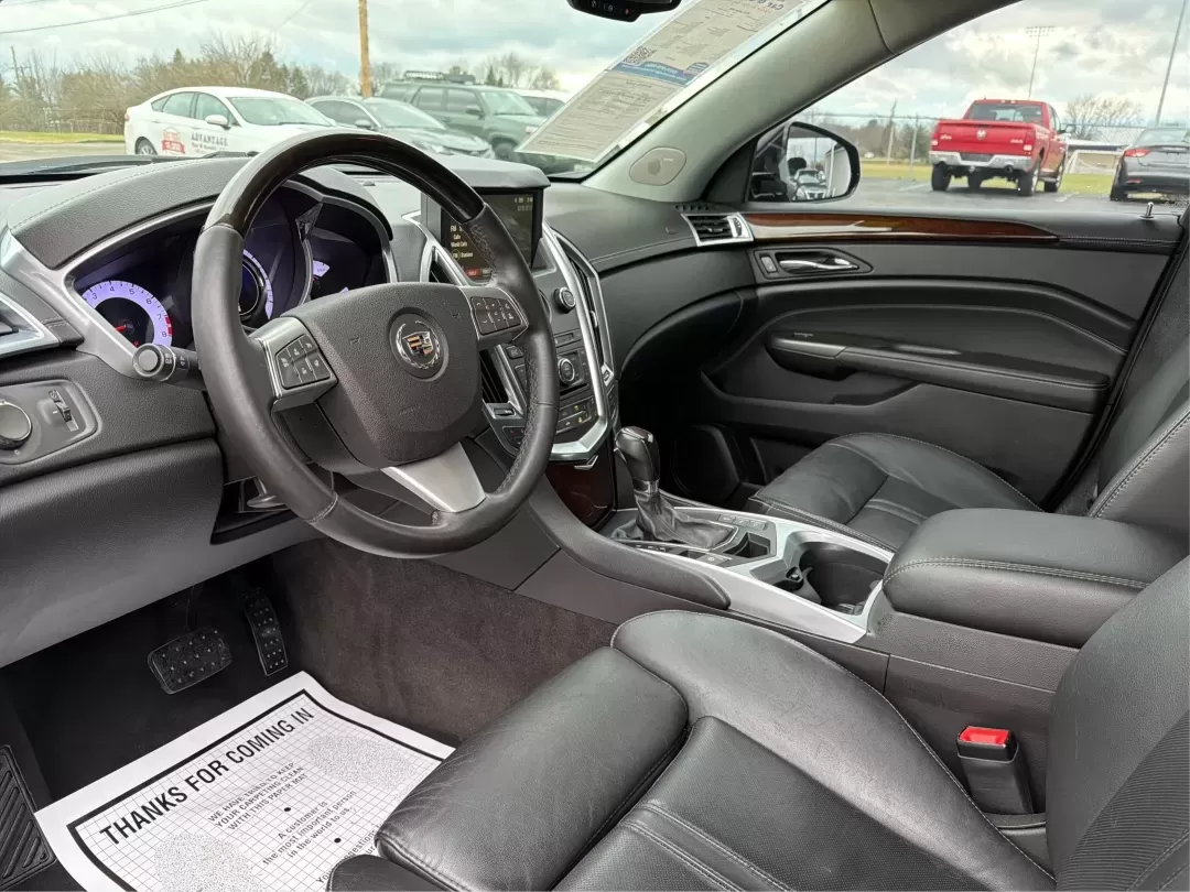 2012 Cadillac SRX Luxury Collection (3GYFNAE33CS) with an 3.6L V-6 gasoline direct injection engine, located at 401 Woodman Dr, Riverside, OH, 45431, (937) 908-9800, 39.760899, -84.123421 - **Experience the Luxury of the 2012 Cadillac SRX: Your Perfect Family SUV Awaits!**<br /> <br /> Are you in search of a vehicle that seamlessly marries style, comfort, and practicality? Whether you're looking for a family-friendly SUV for school drop-offs, a reliable companion for long commutes, or - Photo#9