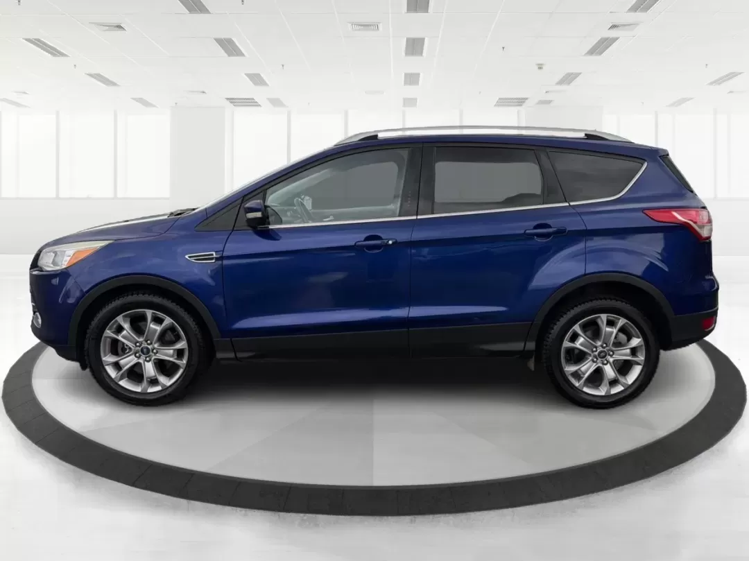 2015 Ford Escape Titanium (1FMCU0J92FU) with an Other engine, located at 880 E. National Road, Vandalia, OH, 45377, (937) 908-9800, 39.891918, -84.183594 - **Adventure Awaits with the 2015 Ford Escape Titanium Your Ideal SUV for Every Journey!**<br /> <br /> Are you looking for the perfect vehicle to accommodate family outings, weekend adventures, or long commutes? The 2015 Ford Escape Titanium, available now at Advantage Car and Credit in Vandalia, O - Photo#5